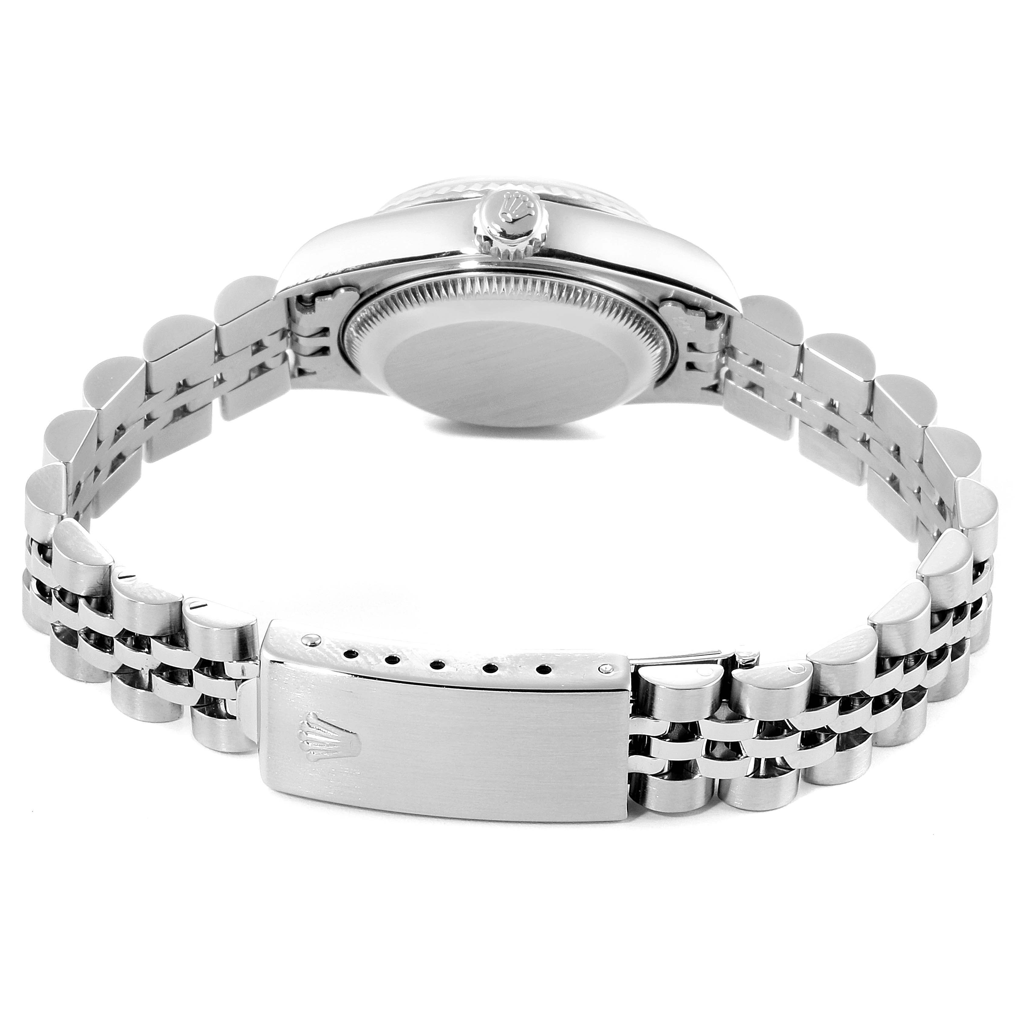 The image shows the back view of a Rolex Datejust 79174 Women's Stainless Steel Silver Dial 79174 Women's Stainless Steel Silver Dial watch, highlighting the case back, crown, and bracelet clasp.