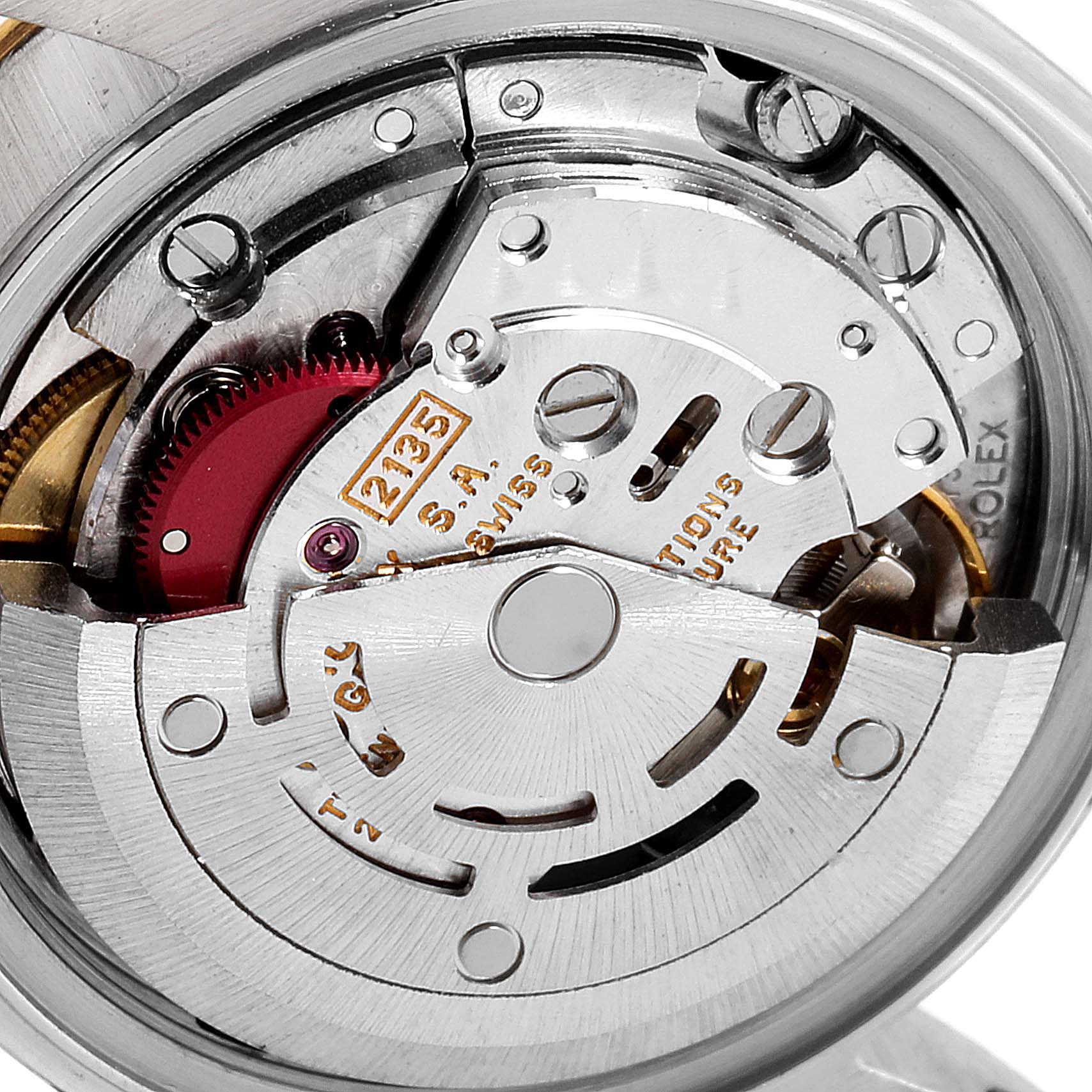 This image shows a detailed close-up of the movement inside a Rolex Datejust 69173 Women's Steel and Gold (two tone) Black Dial 69173 Women's Steel and Gold (two tone) Black Dial watch, highlighting the gears and mechanical parts.