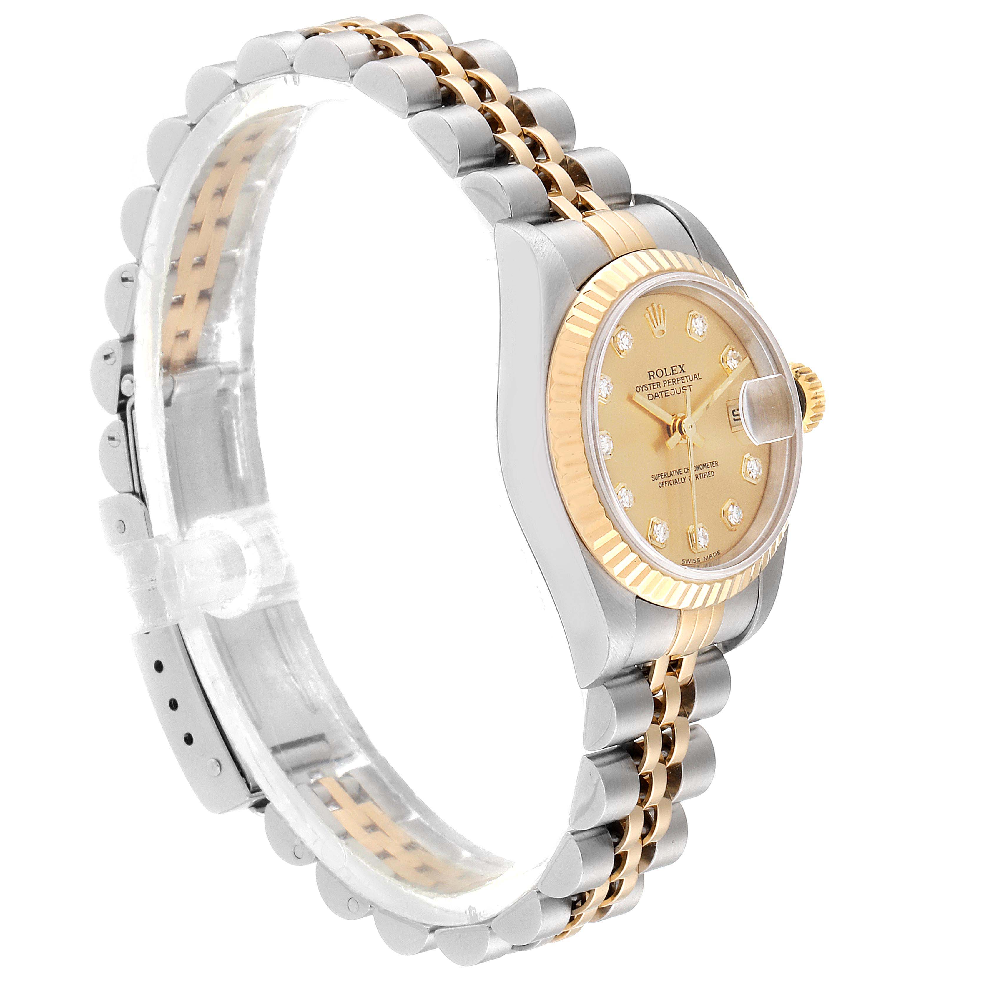 The image shows a side view of a Rolex Datejust 79173 Women's Stainless Steel Champagne Dial 79173 Women's Stainless Steel Champagne Dial watch, highlighting its two-tone bracelet, dial, and fluted bezel.