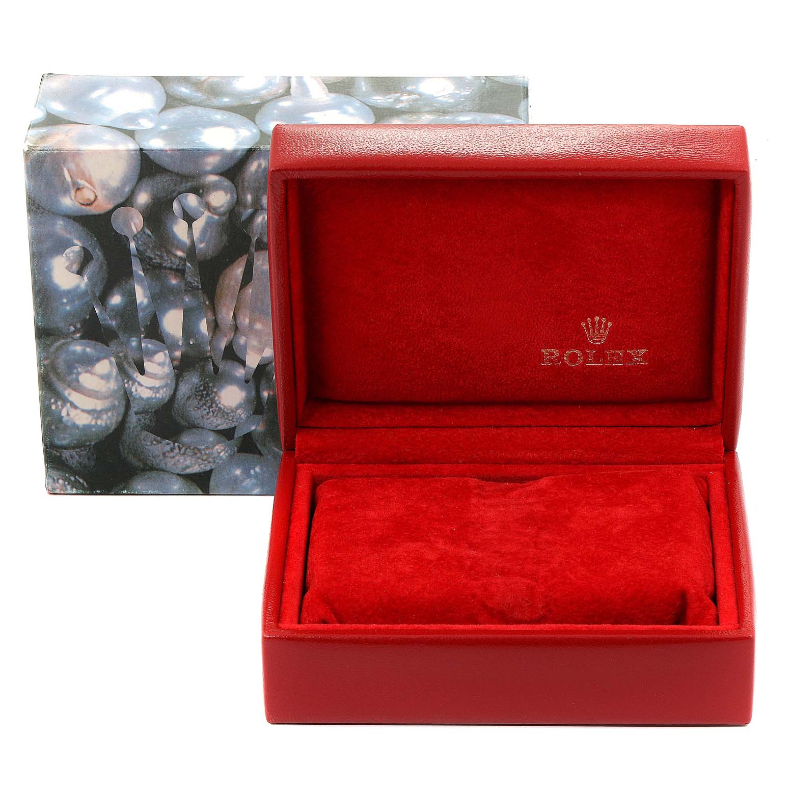 This image shows a red Rolex watch box at a frontal angle, with the outer decorative box in the background.