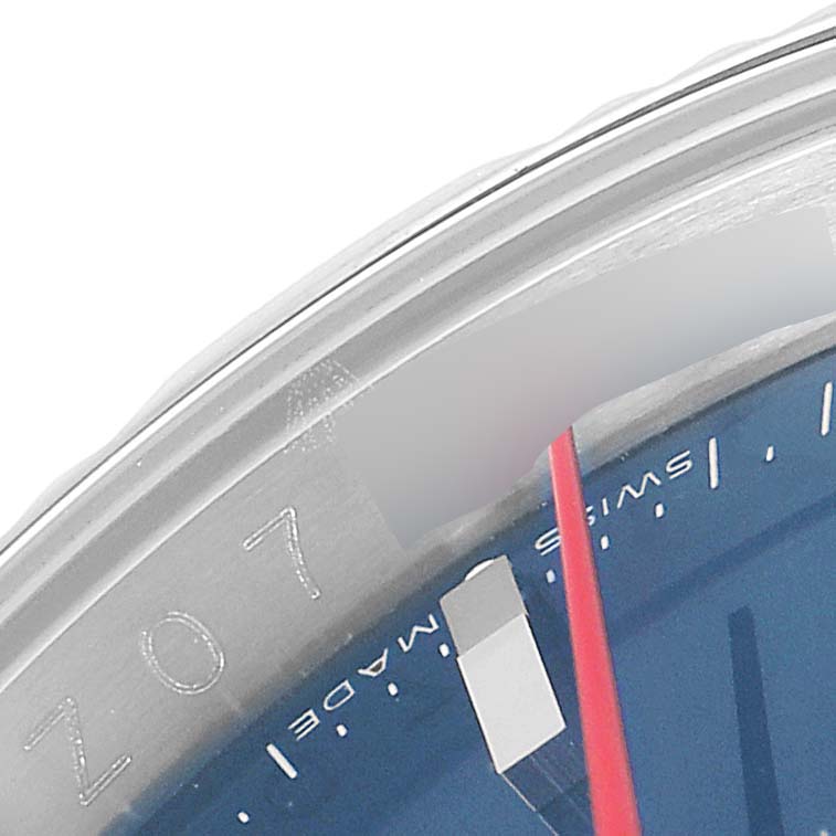 This close-up image shows the Turn-o-Graph model by Rolex, focusing on the bezel and part of the dial with the second-hand and "Swiss Made" text.