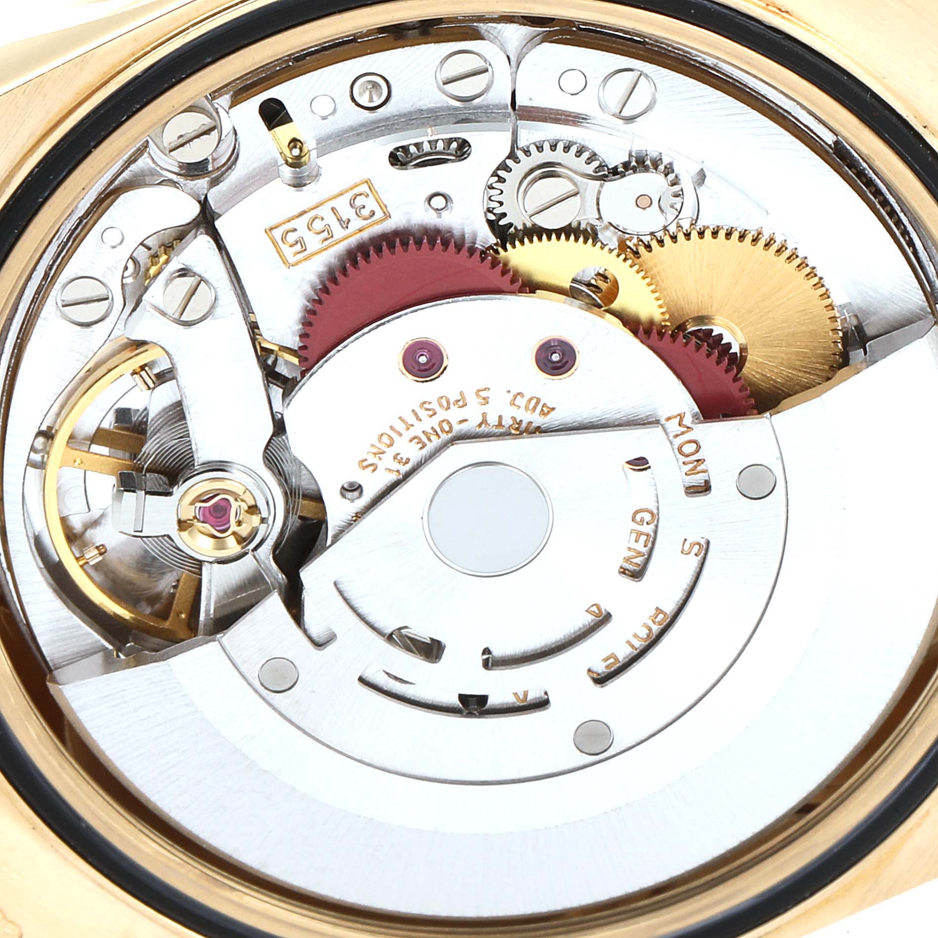 This is an interior view of the President model by Rolex, showing its intricate gears and movement mechanism.