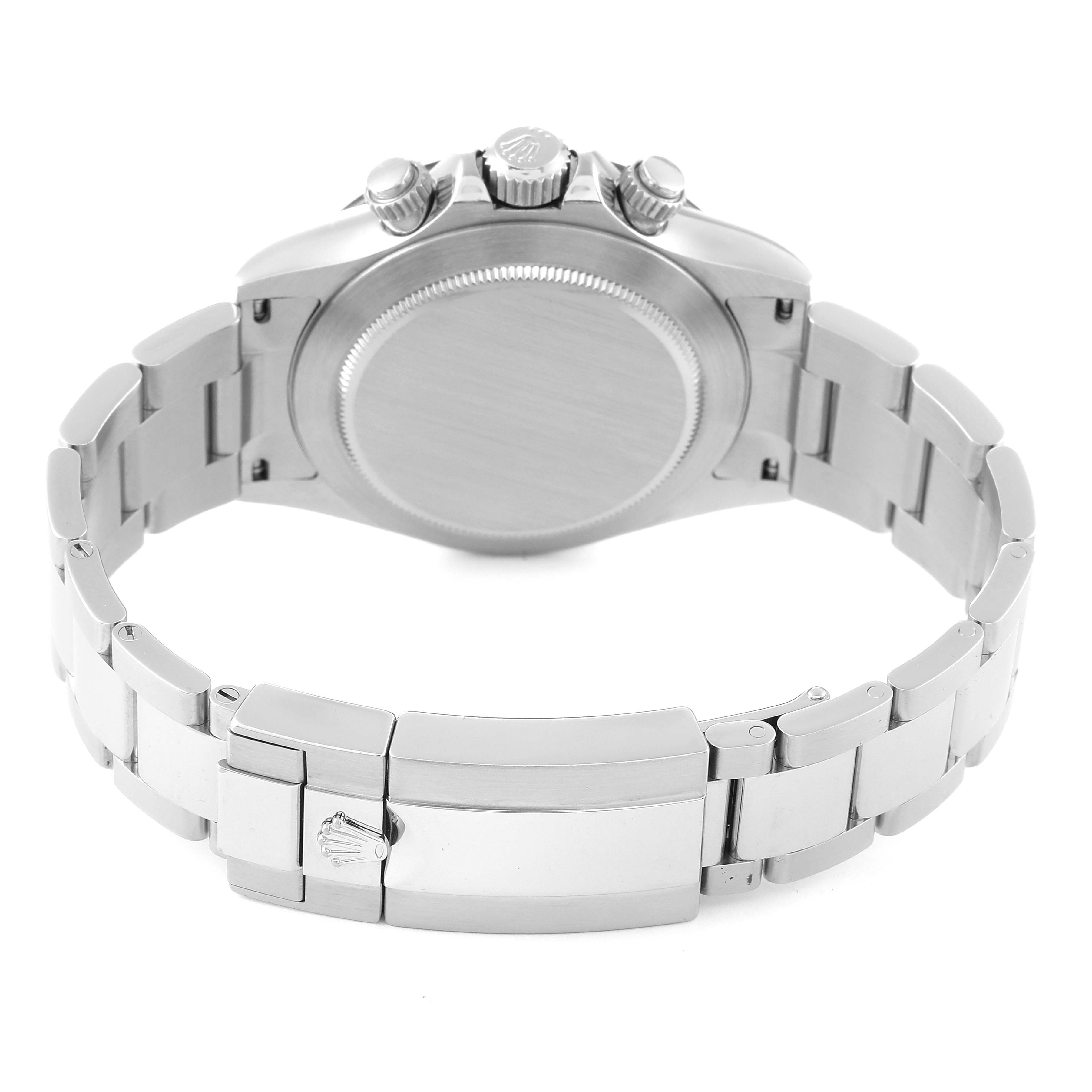 This image shows the case back, crown, pushers, and bracelet of a Rolex Daytona 116500 Men
s Stainless Steel White Dial 116500 Men
s Stainless Steel White Dial watch from a rear angle.