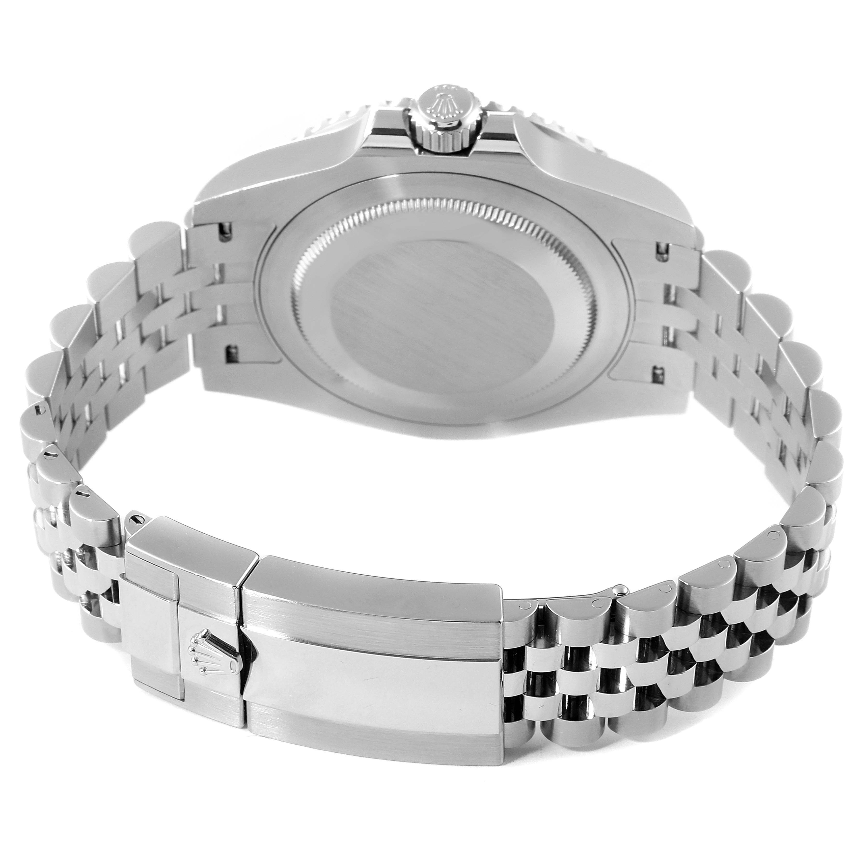 The image shows the back view of a Rolex GMT-Master 126710 Men
s Stainless Steel Black Dial 126710 Men
s Stainless Steel Black Dial watch, focusing on the case back and bracelet clasp.