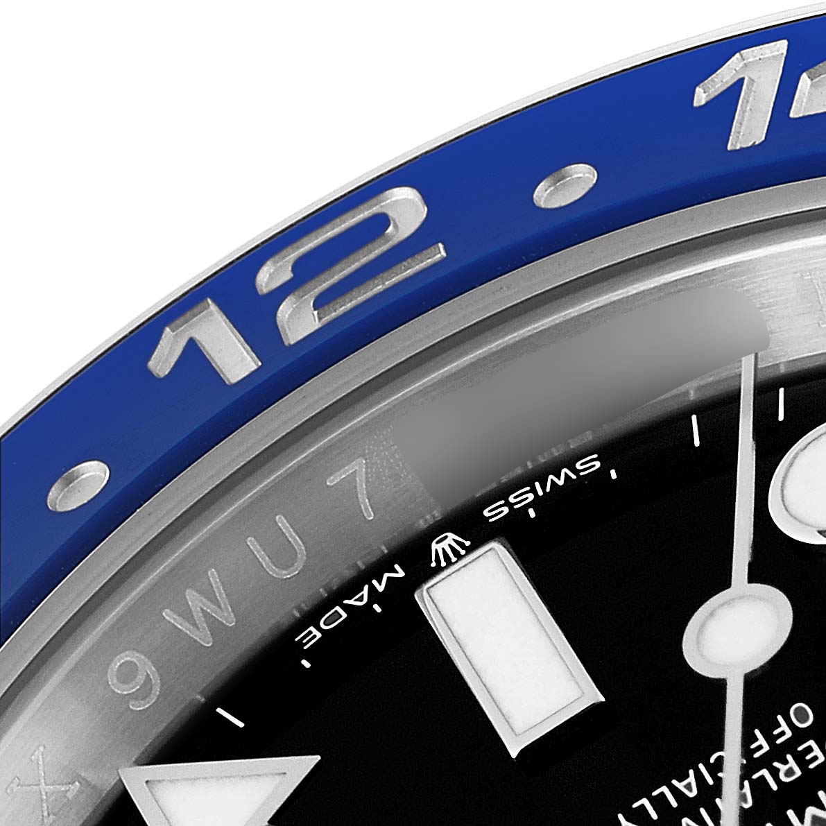 This image shows a close-up of the bezel and dial, including the 12-hour marker, of a Rolex GMT-Master 126710 Men
s Stainless Steel Black Dial 126710 Men
s Stainless Steel Black Dial watch model.
