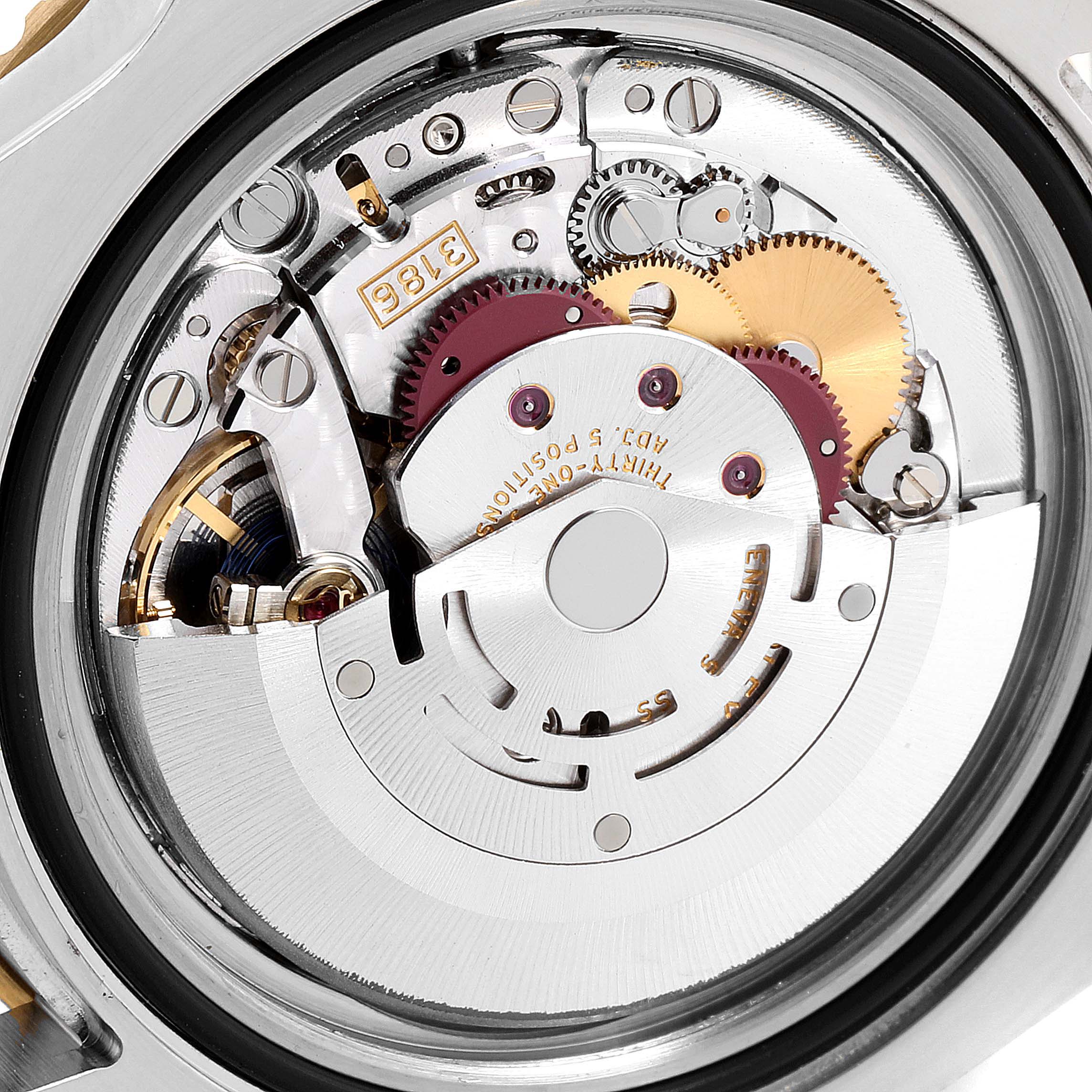 This image shows the internal mechanical movement of a Rolex GMT-Master 116713 Men's Steel and Gold (two tone) Black Dial 116713 Men's Steel and Gold (two tone) Black Dial watch, pictured from the back.
