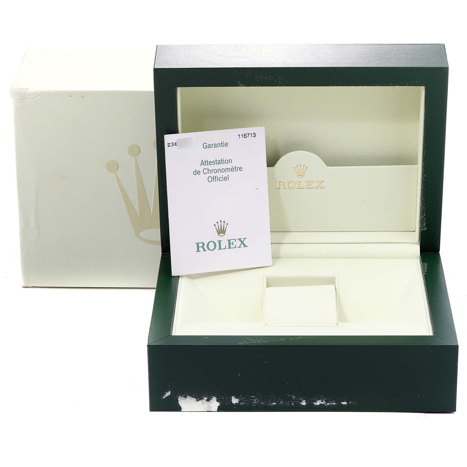 The image shows an open box for a Rolex GMT-Master 116713 Men's Steel and Gold (two tone) Black Dial 116713 Men's Steel and Gold (two tone) Black Dial with its official warranty card above a compartment.