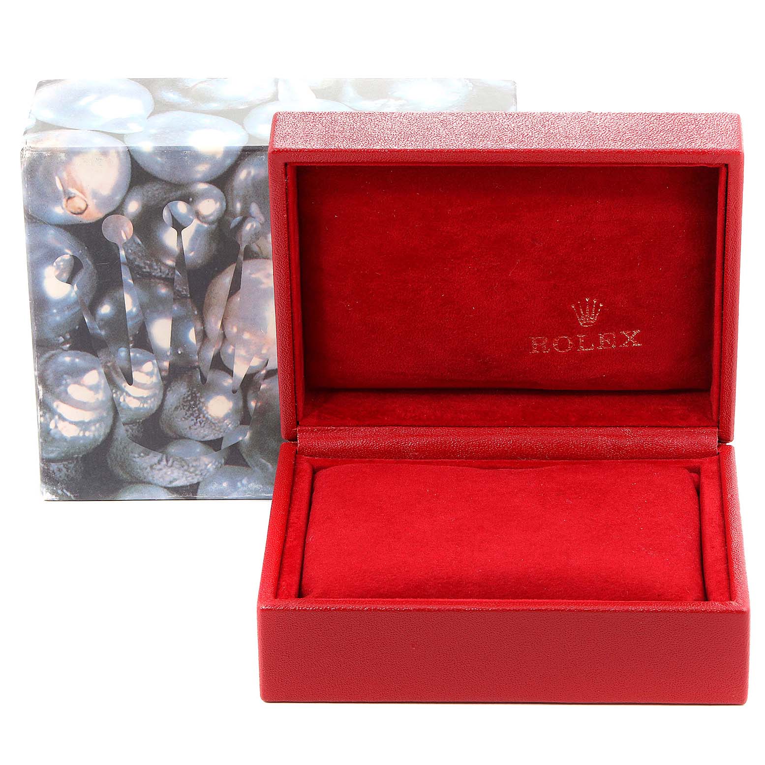 The image shows a red Rolex box for the Oyster Perpetual model, with the Rolex logo inside.