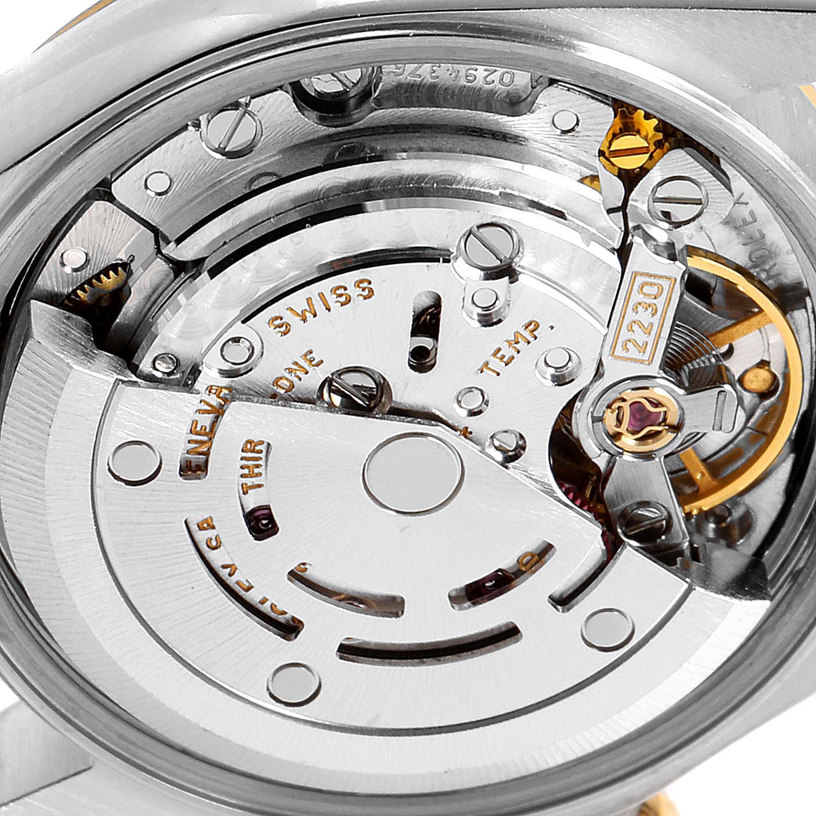 This image shows a close-up view of the movement mechanism in a Rolex Oyster Perpetual 76193 Women's Steel and Gold (two tone) White Dial 76193 Women's Steel and Gold (two tone) White Dial watch.