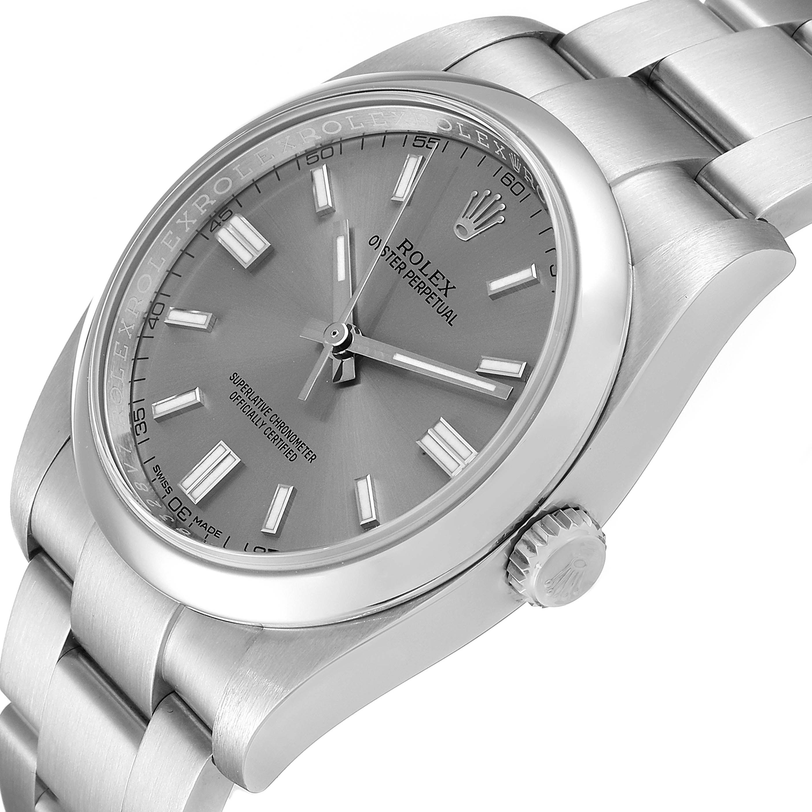 The Rolex Oyster Perpetual 116000 Men's Stainless Steel Grey Dial 116000 Men's Stainless Steel Grey Dial watch is shown from an angled view, highlighting its dial, bezel, crown, and part of the bracelet.