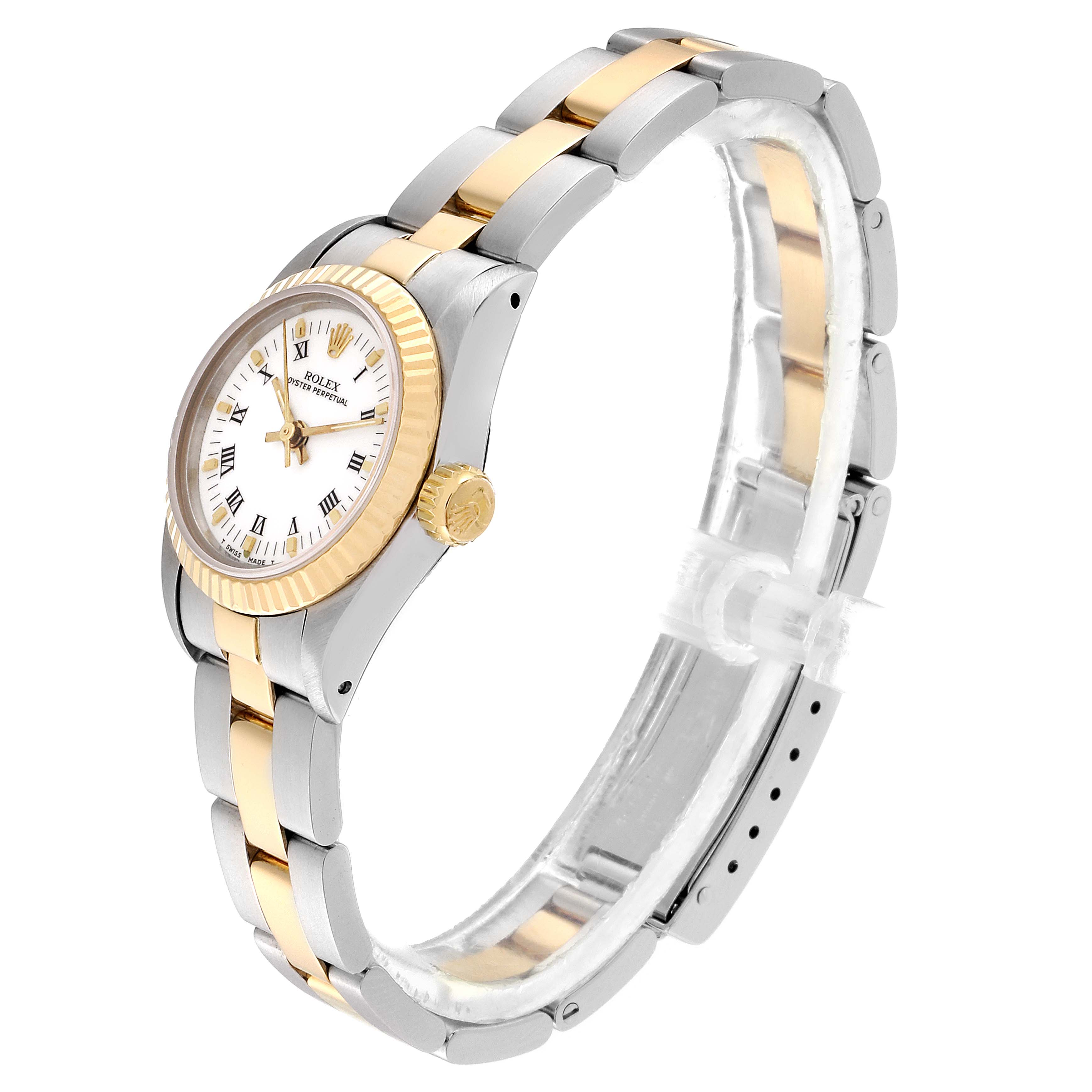 This image shows a side angle of a Rolex Datejust 67193 Women's Steel and Gold (two tone) White Dial 67193 Women's Steel and Gold (two tone) White Dial watch, displaying its band, case, crown, and part of the dial.