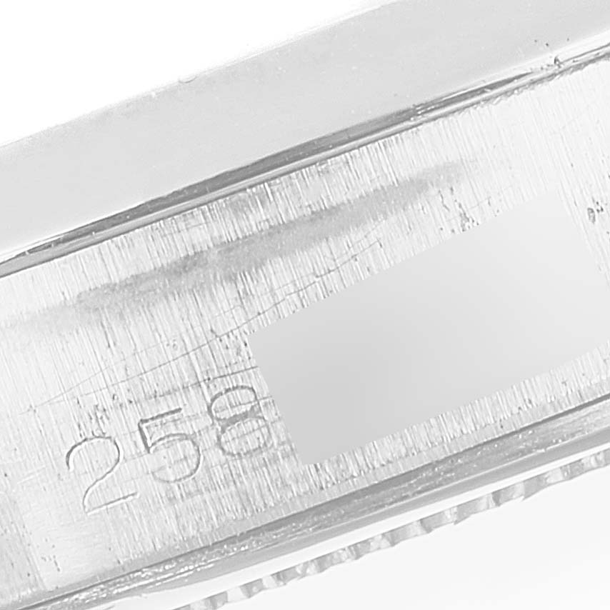 The image shows an engraved side view of the bezel from a Vintage Collection model by Rolex.