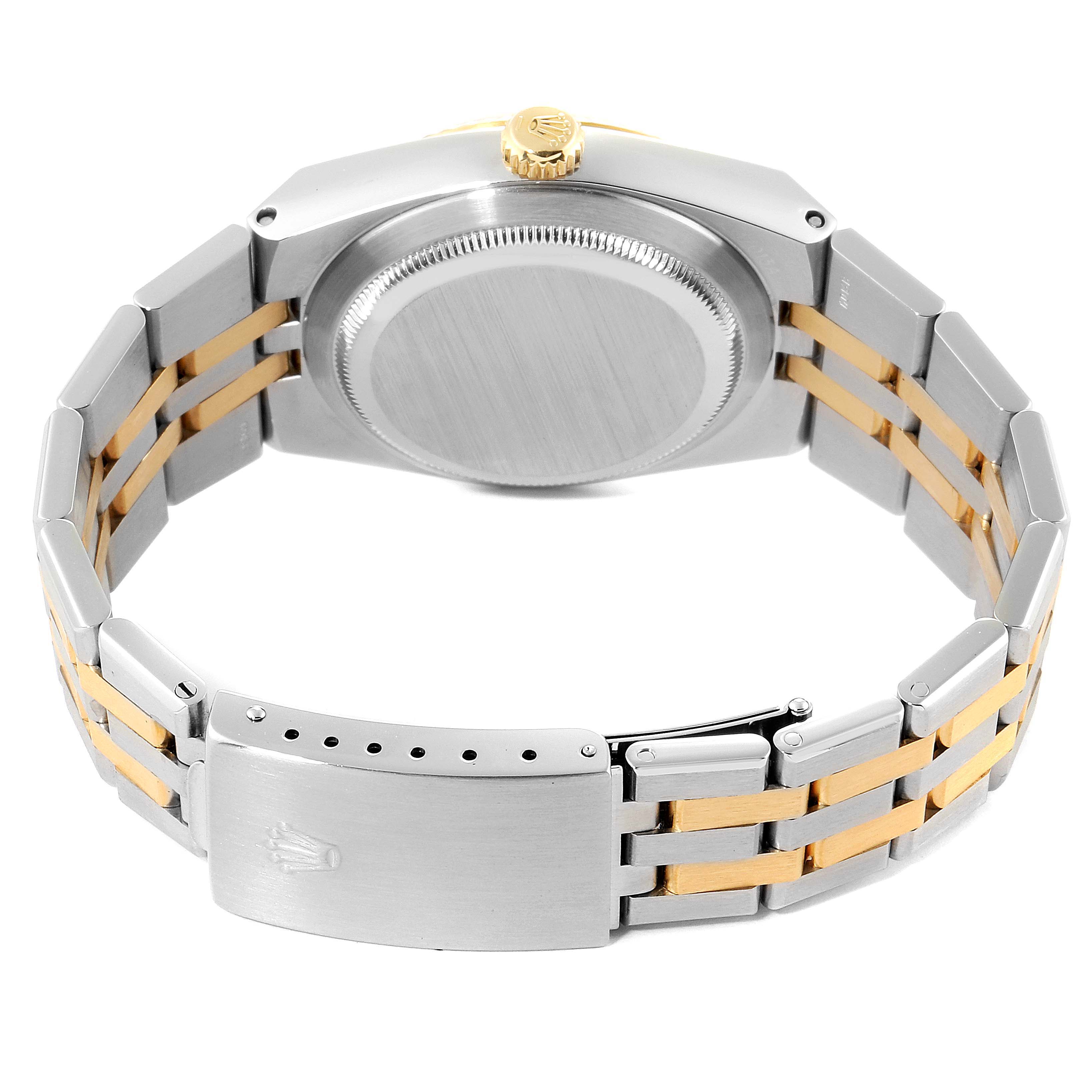 This image shows the back casing and bracelet clasp of a Rolex Oysterquartz 16865 Men's Stainless Steel White Dial 16865 Men's Stainless Steel White Dial watch, highlighting the two-tone metal design.