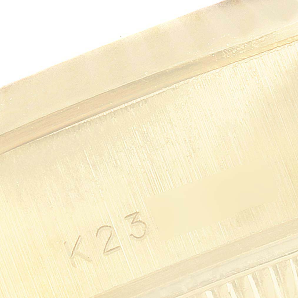 The image shows a close-up of the watch case with serial numbers for the Rolex President 79178 Women's Yellow Gold White Dial 79178 Women's Yellow Gold White Dial model.