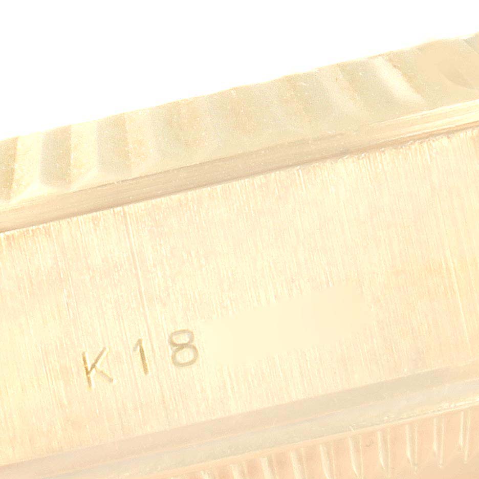 This close-up image shows the 18K gold marking on the band of a Rolex President 79178 Women
s Yellow Gold Champagne Dial 79178 Women
s Yellow Gold Champagne Dial model watch.