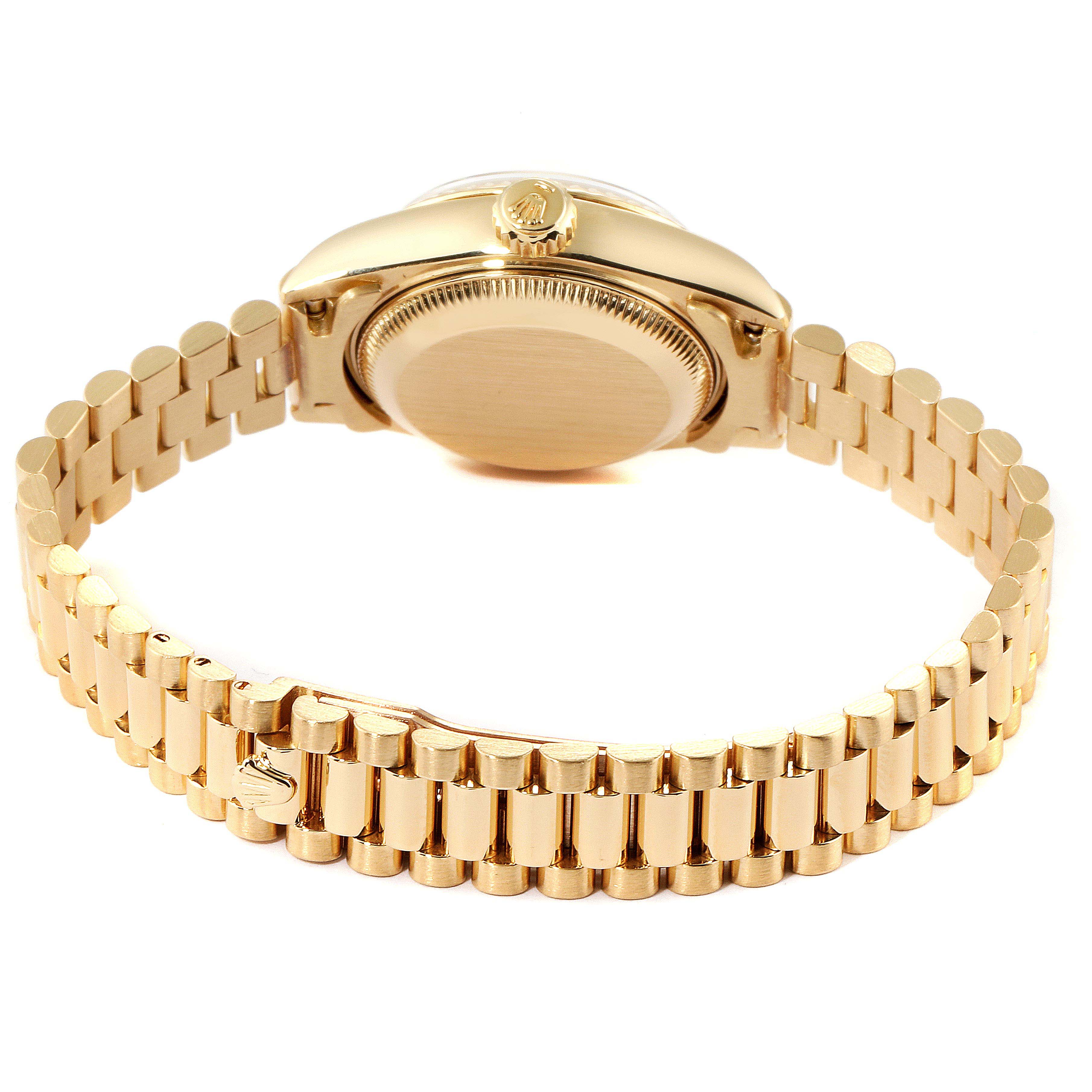 This image shows the back view of a Rolex President 69178 Women's Yellow Gold Champagne Dial 69178 Women's Yellow Gold Champagne Dial model watch, highlighting its case back, crown, and President bracelet.