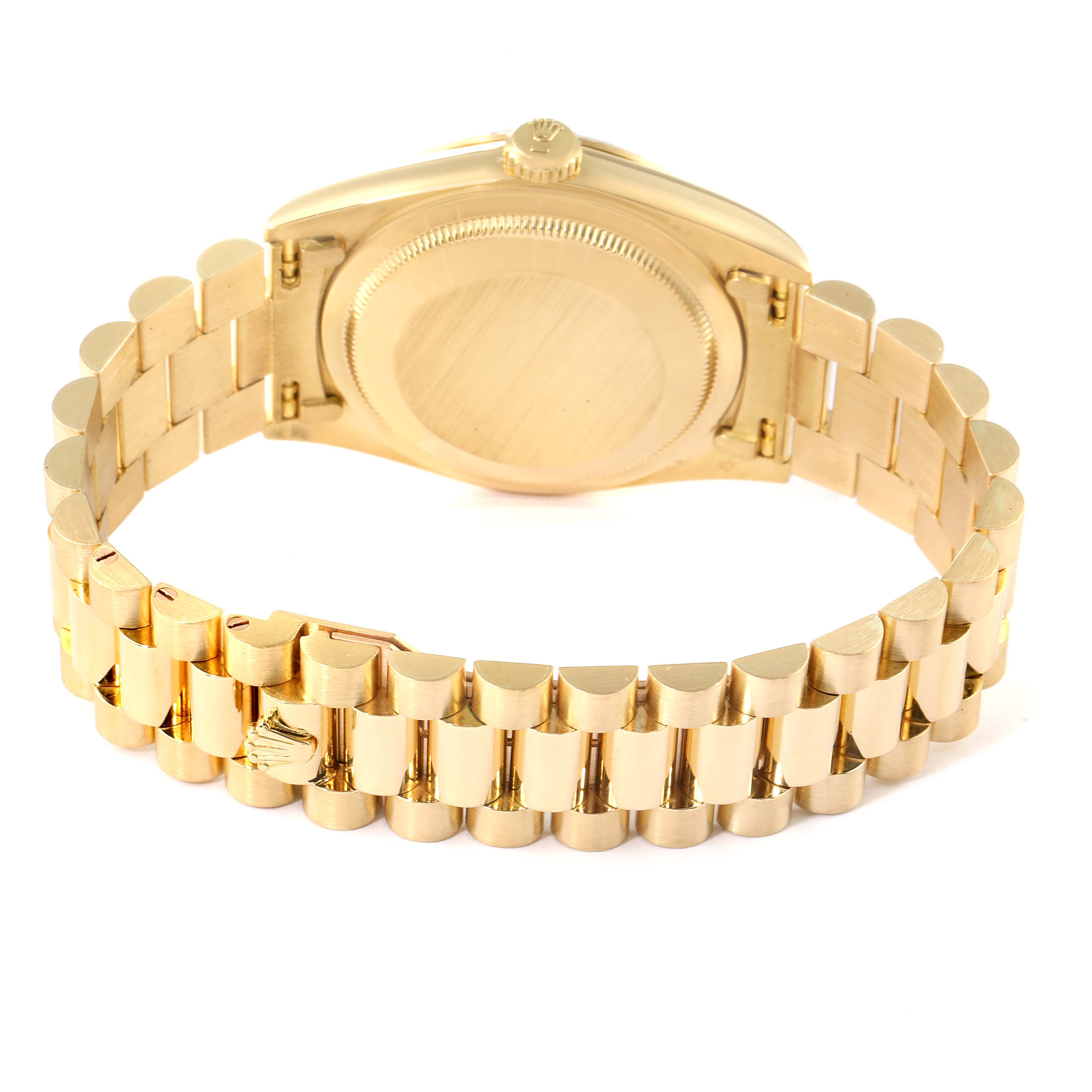 The image shows the back of the Rolex President 18238 Men
s Yellow Gold Black Dial 18238 Men
s Yellow Gold Black Dial model watch, focusing on the case back and the polished bracelet.