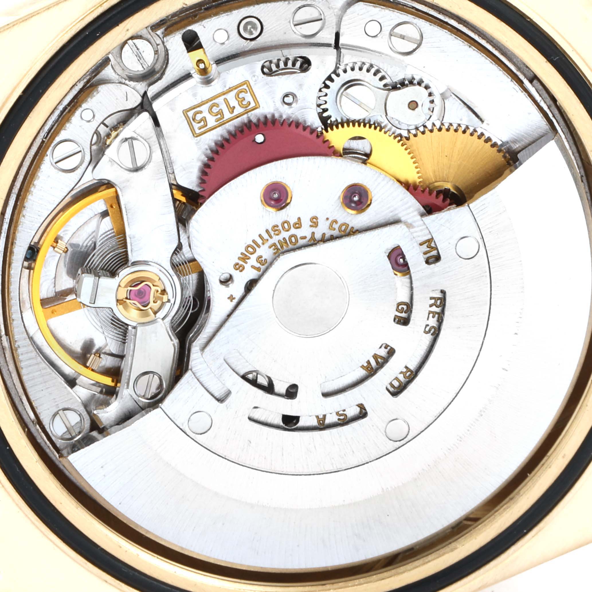 The image shows the intricate internal mechanism of a Rolex President 18238 Men
s Yellow Gold Champagne Dial 18238 Men
s Yellow Gold Champagne Dial model watch, viewed from the back.