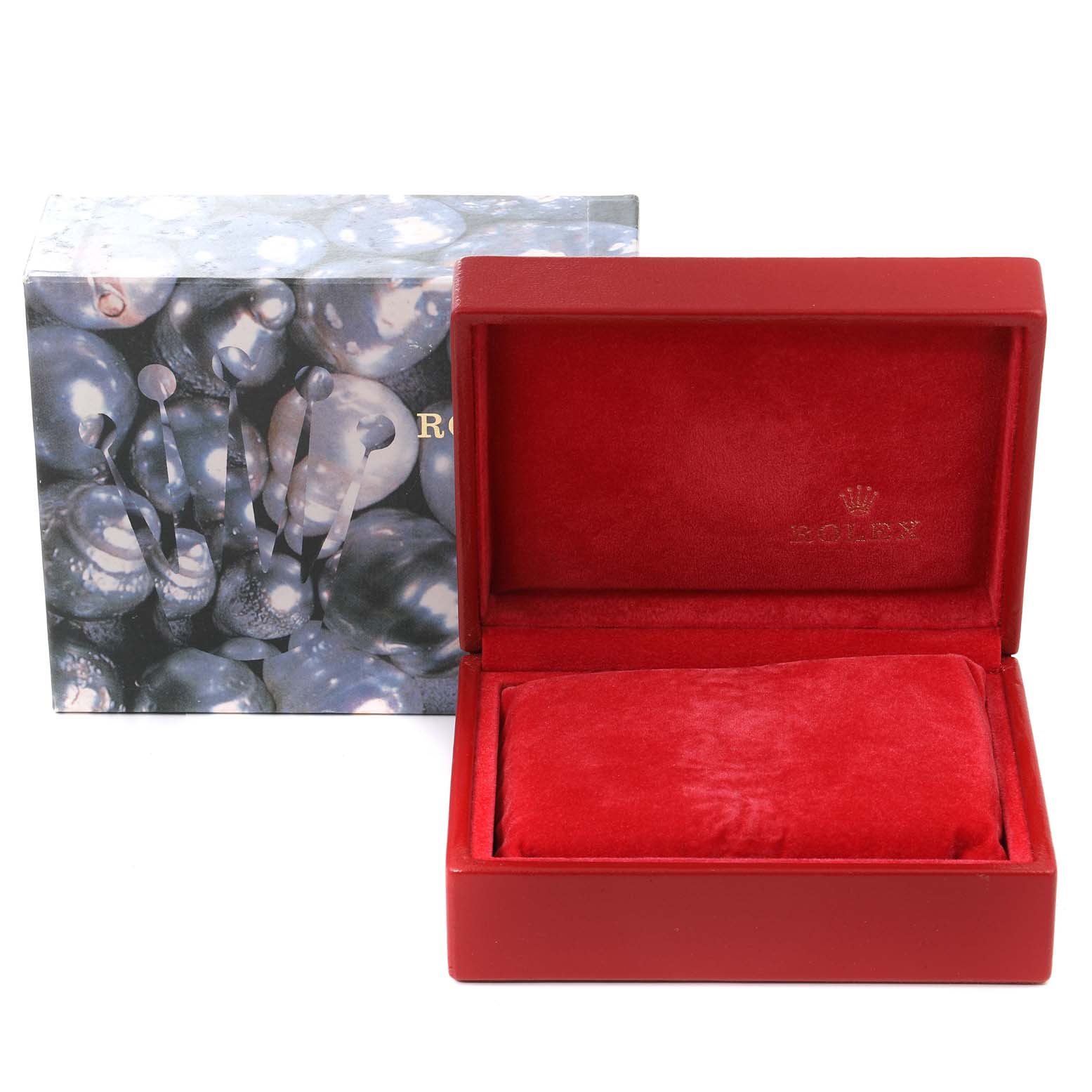 The image shows an empty red Rolex watch box for the President model, with a decorative outer box in the background.