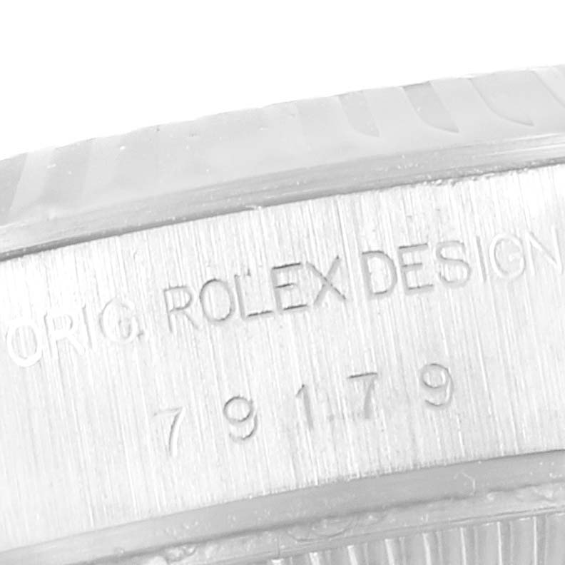 The image shows a close-up of the casing detail, displaying the model and serial number engraving for a Rolex President 79179 Women's White Gold Silver Dial 79179 Women's White Gold Silver Dial watch.