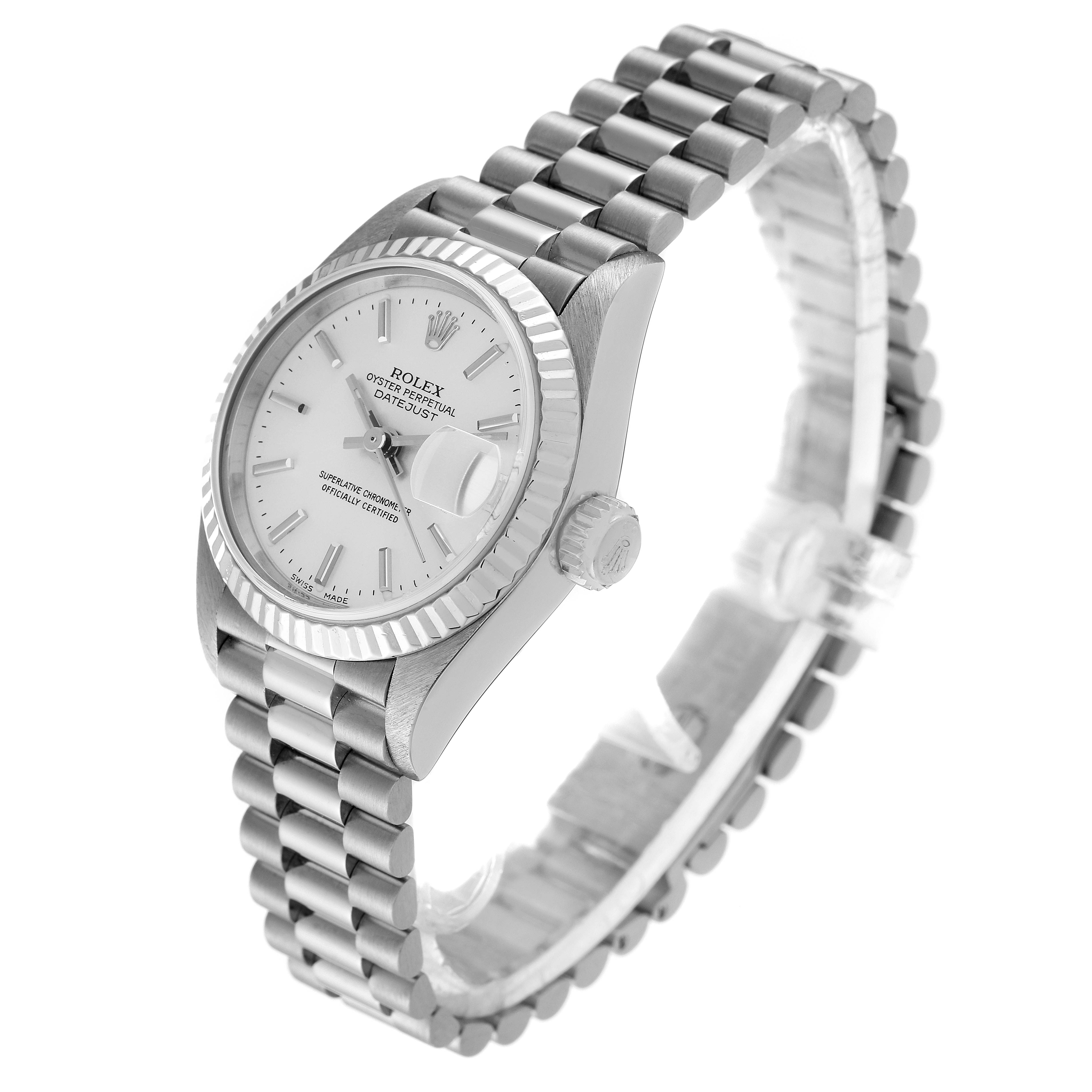 The Rolex President 79179 Women's White Gold Silver Dial 79179 Women's White Gold Silver Dial model watch is shown at an angled side view, displaying its links, dial, bezel, and crown.