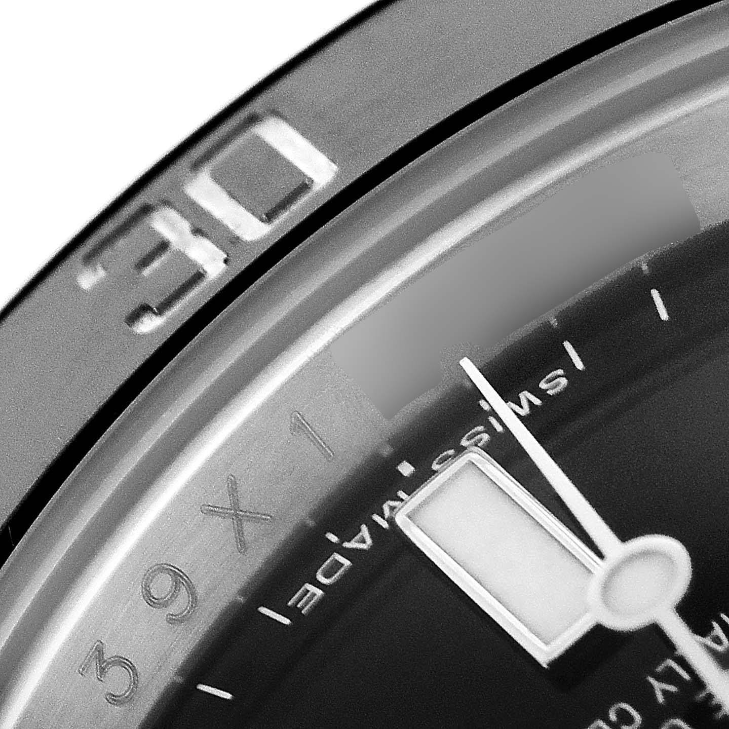 This image shows a close-up of the dial, bezel, and part of the minute hand of the Rolex Submariner 114060 Men
s Stainless Steel Black Dial 114060 Men
s Stainless Steel Black Dial watch.