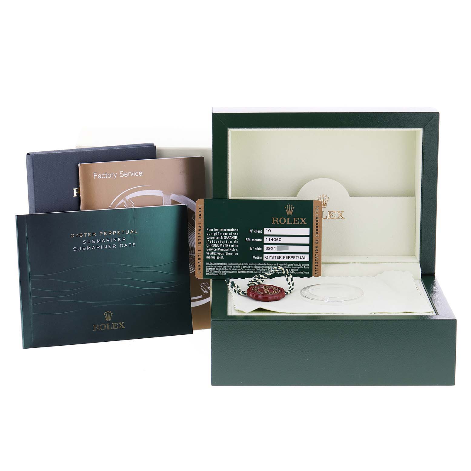 The image shows the packaging, guarantee card, manuals, and accessories for a Rolex Submariner 114060 Men
s Stainless Steel Black Dial 114060 Men
s Stainless Steel Black Dial watch.