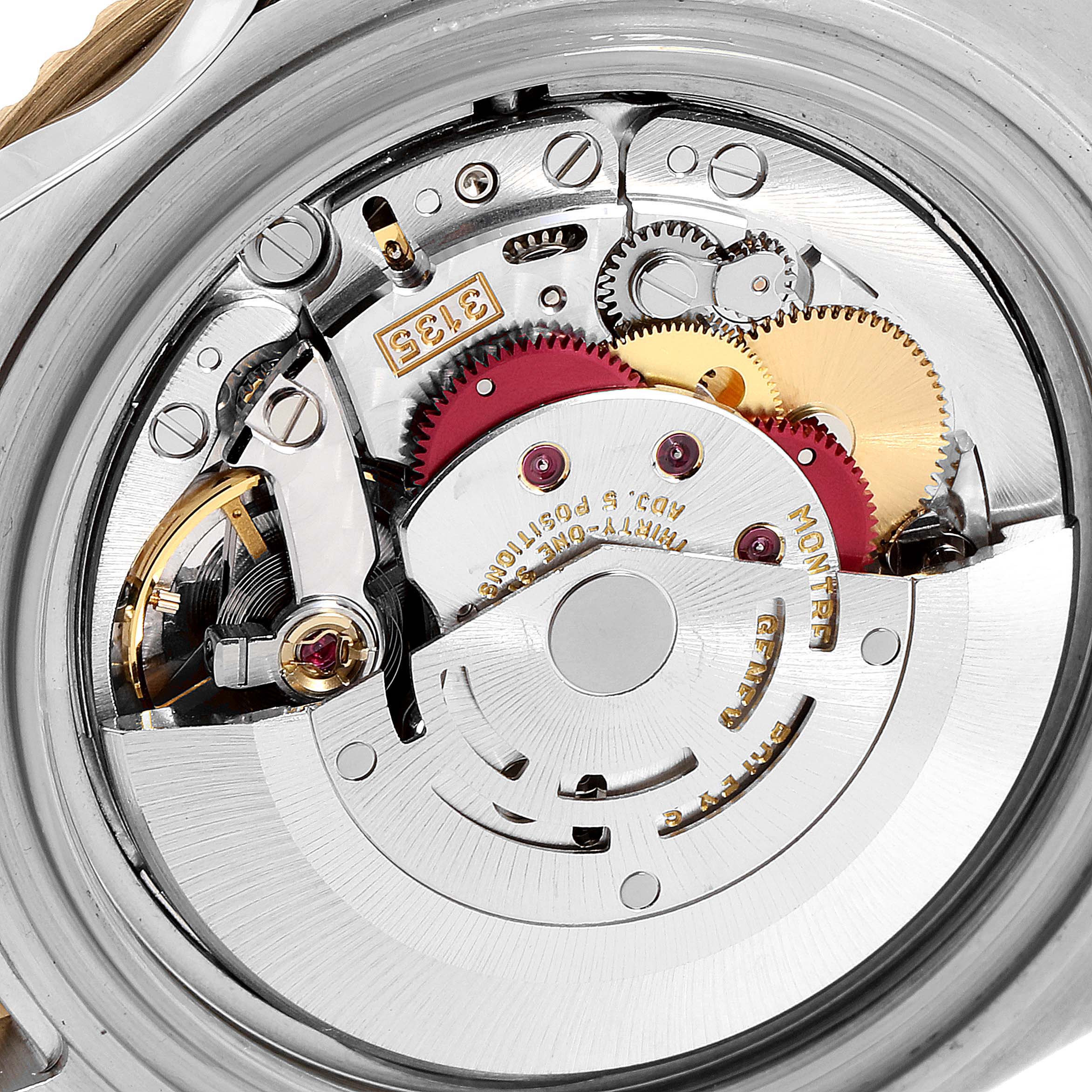 This image shows a close-up view of the internal mechanism of a Rolex Submariner 16613 Men's Steel and Gold (two tone) Blue Dial 16613 Men's Steel and Gold (two tone) Blue Dial watch.