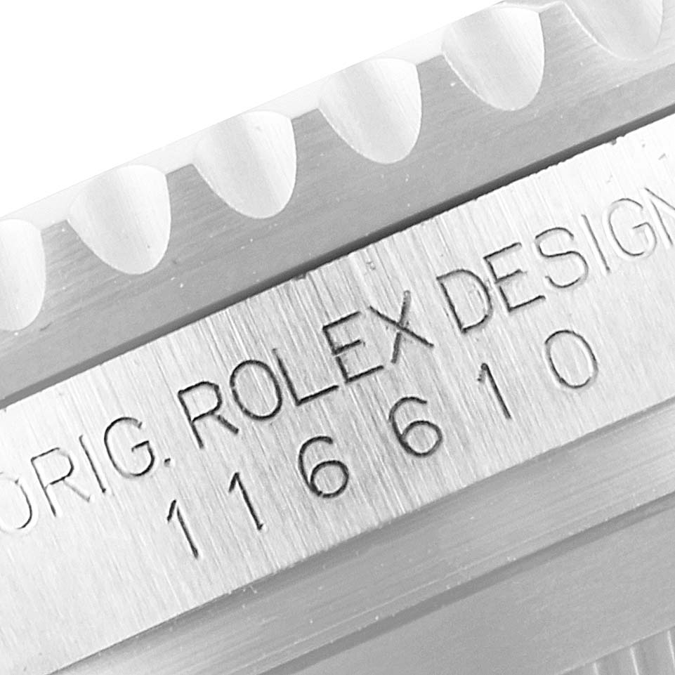 A close-up of a Rolex Submariner 116610LN Men
s Stainless Steel Black Dial 116610LN Men
s Stainless Steel Black Dial
s case side, showing the model number 116610 and the original Rolex design engraving.