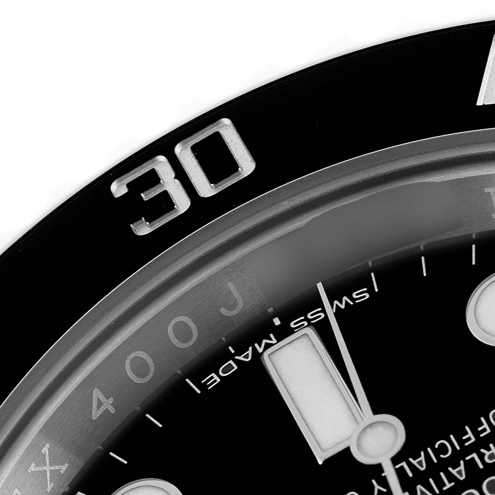 The image shows a close-up angle of the bezel and dial of a Rolex Submariner 116610LN Men
s Stainless Steel Black Dial 116610LN Men
s Stainless Steel Black Dial watch displaying the "30" mark.
