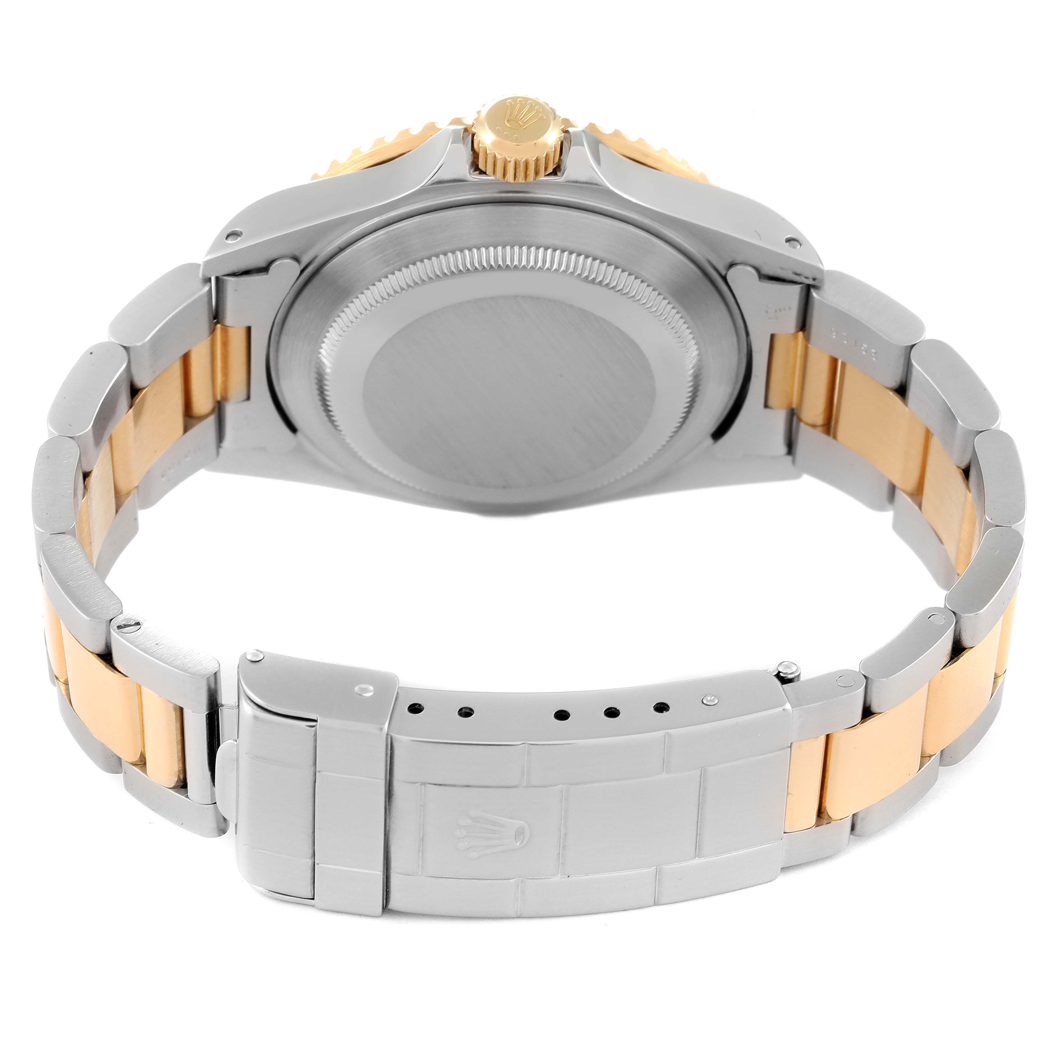 The image shows the back and bracelet of a Rolex Submariner 16613 Men's Steel and Gold (two tone) Blue Dial 16613 Men's Steel and Gold (two tone) Blue Dial, including the clasp and crown.