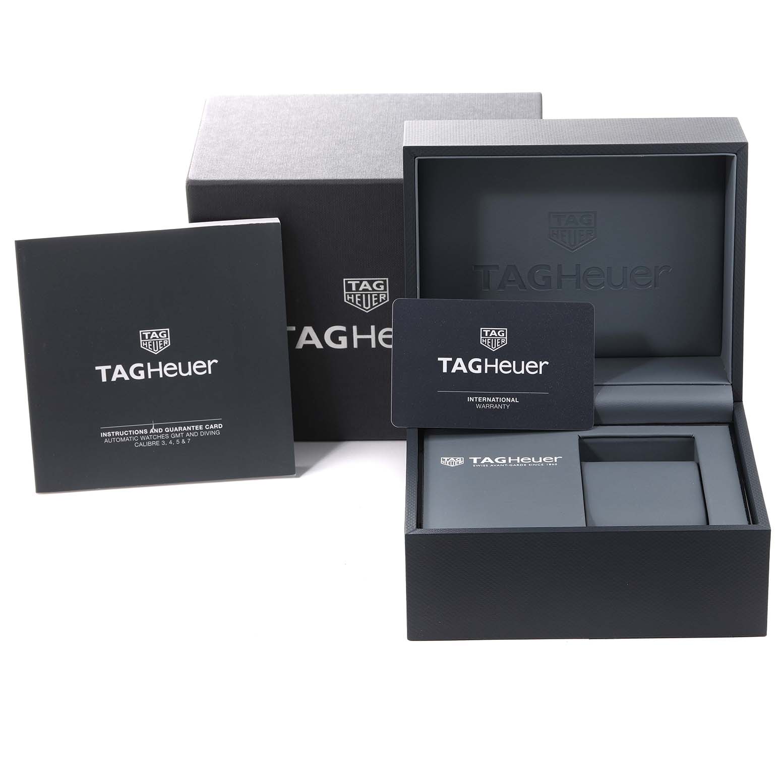 The image shows the packaging box, instructions booklet, and warranty card for the Tag Heuer Aquaracer WAY201F Men's Stainless Steel Black Dial WAY201F Men's Stainless Steel Black Dial watch.