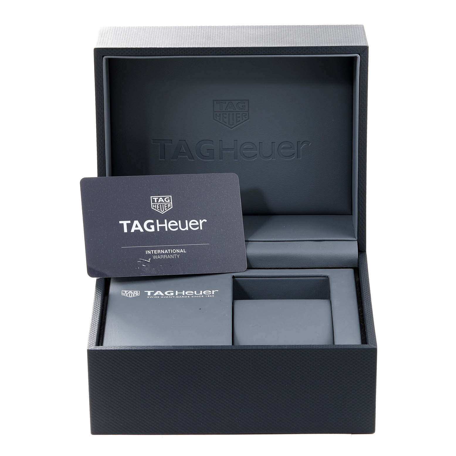 The image shows an open Tag Heuer Carrera CBG2A1Z.BA0658 Men's Stainless Steel Transparent Dial CBG2A1Z.BA0658 Men's Stainless Steel Transparent Dial watch box with an international warranty card inside.