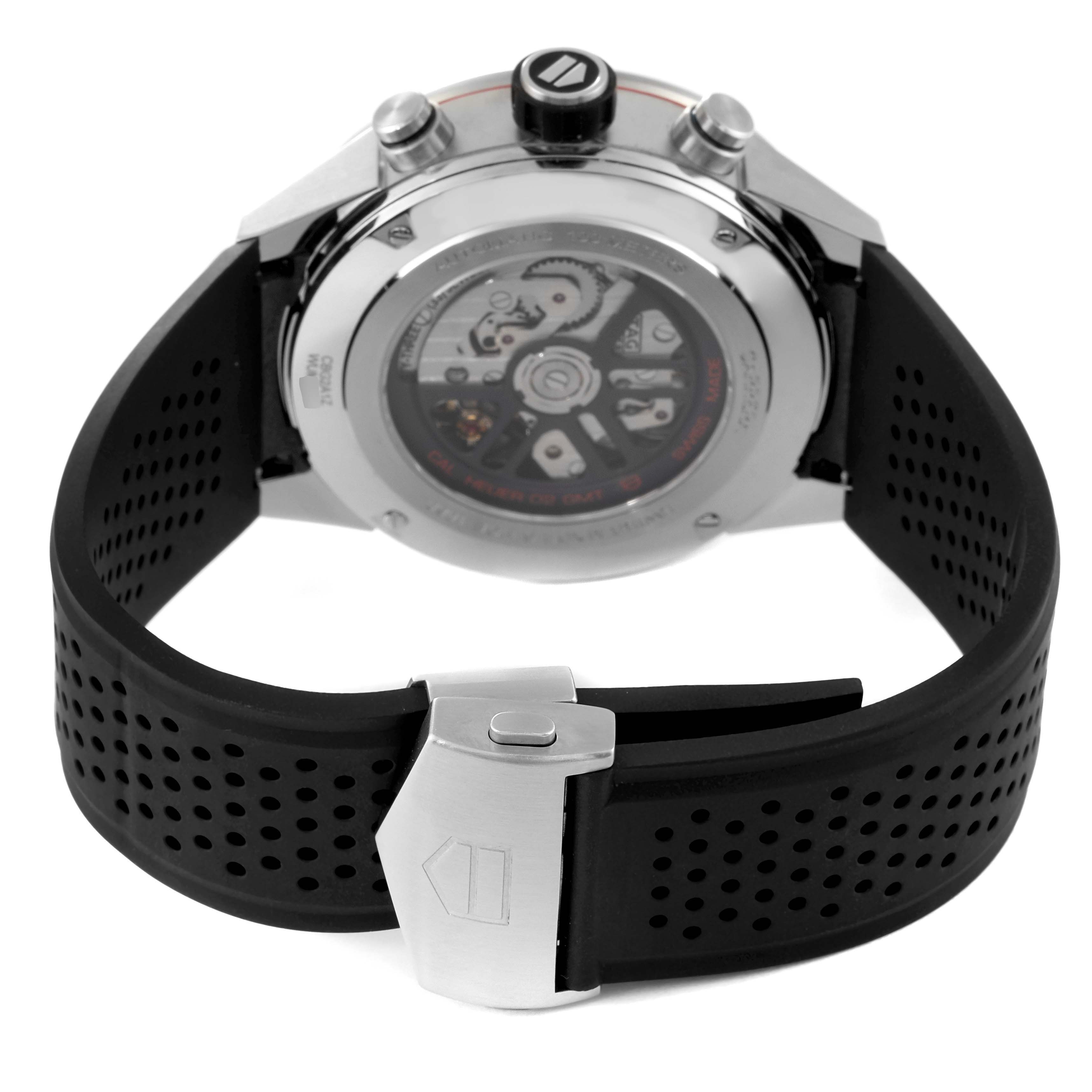 The image shows the back view of a Tag Heuer Carrera CBG2A1Z.BA0658 Men's Stainless Steel Transparent Dial CBG2A1Z.BA0658 Men's Stainless Steel Transparent Dial watch, highlighting its transparent case back and black perforated rubber strap with a clasp.