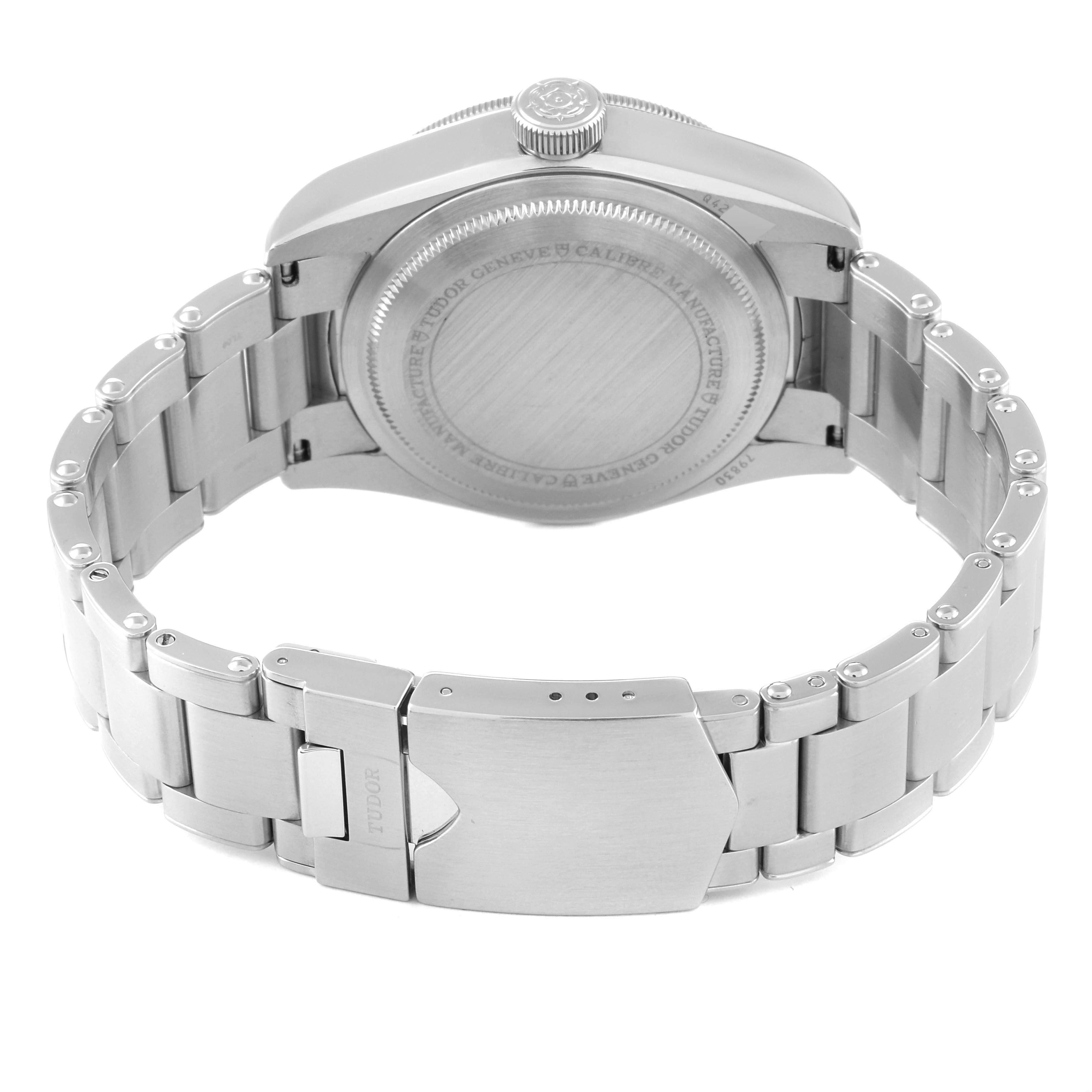 The image shows the back view of the Tudor Heritage Black Bay 79830RB Men
s Stainless Steel Black Dial 79830RB Men
s Stainless Steel Black Dial watch, highlighting its stainless steel case back, bracelet, and clasp.