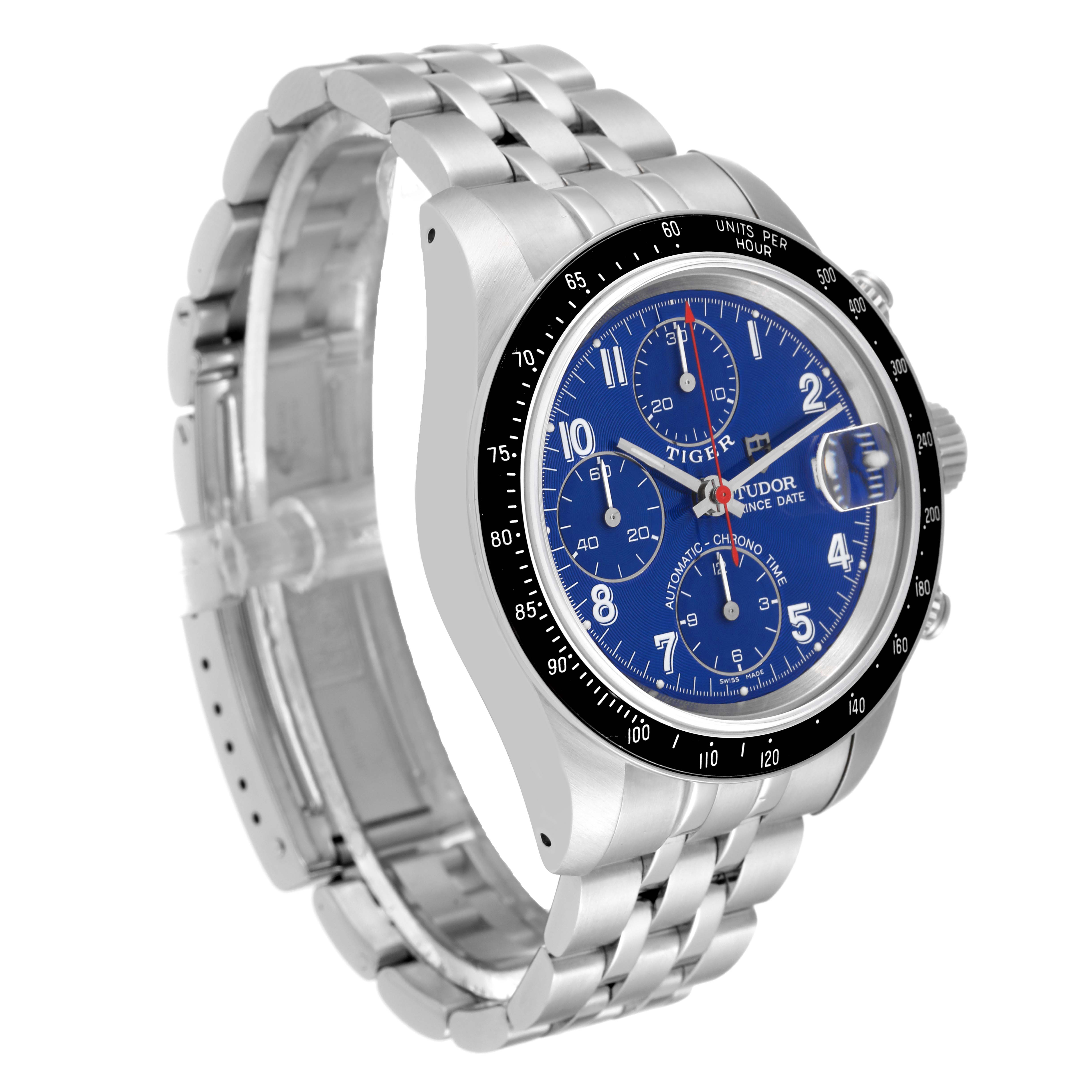 The image shows a Tudor Tiger 79260 Men's Stainless Steel Blue Dial 79260 Men's Stainless Steel Blue Dial model watch at a three-quarter angle, highlighting its blue dial, bezel, and metal bracelet.