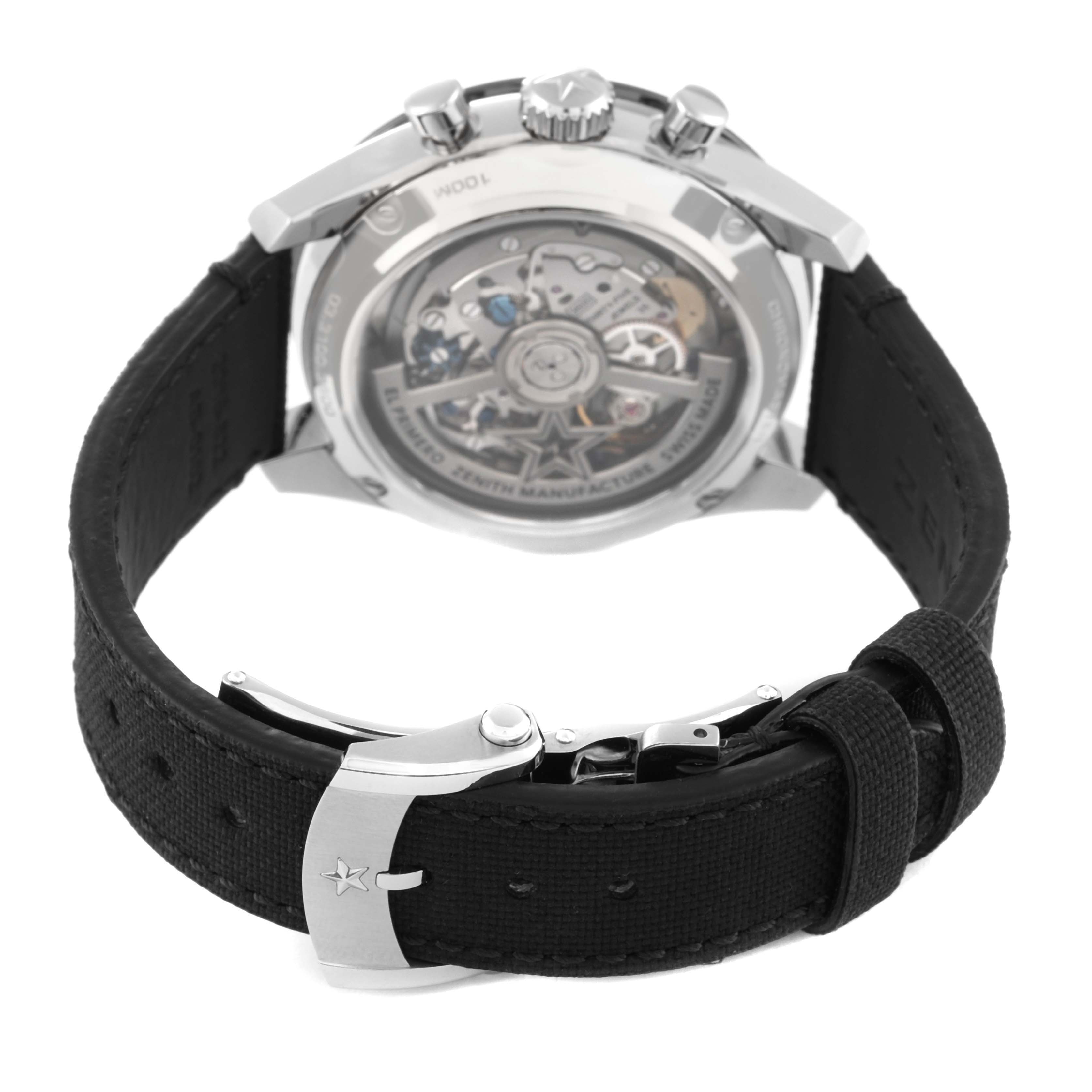 The image shows the back view of a Zenith Chronomaster 03.3100.3600/21.M3100 Men's Stainless Steel Black Dial 03.3100.3600/21.M3100 Men's Stainless Steel Black Dial watch, highlighting the movement and the black strap with a clasp.