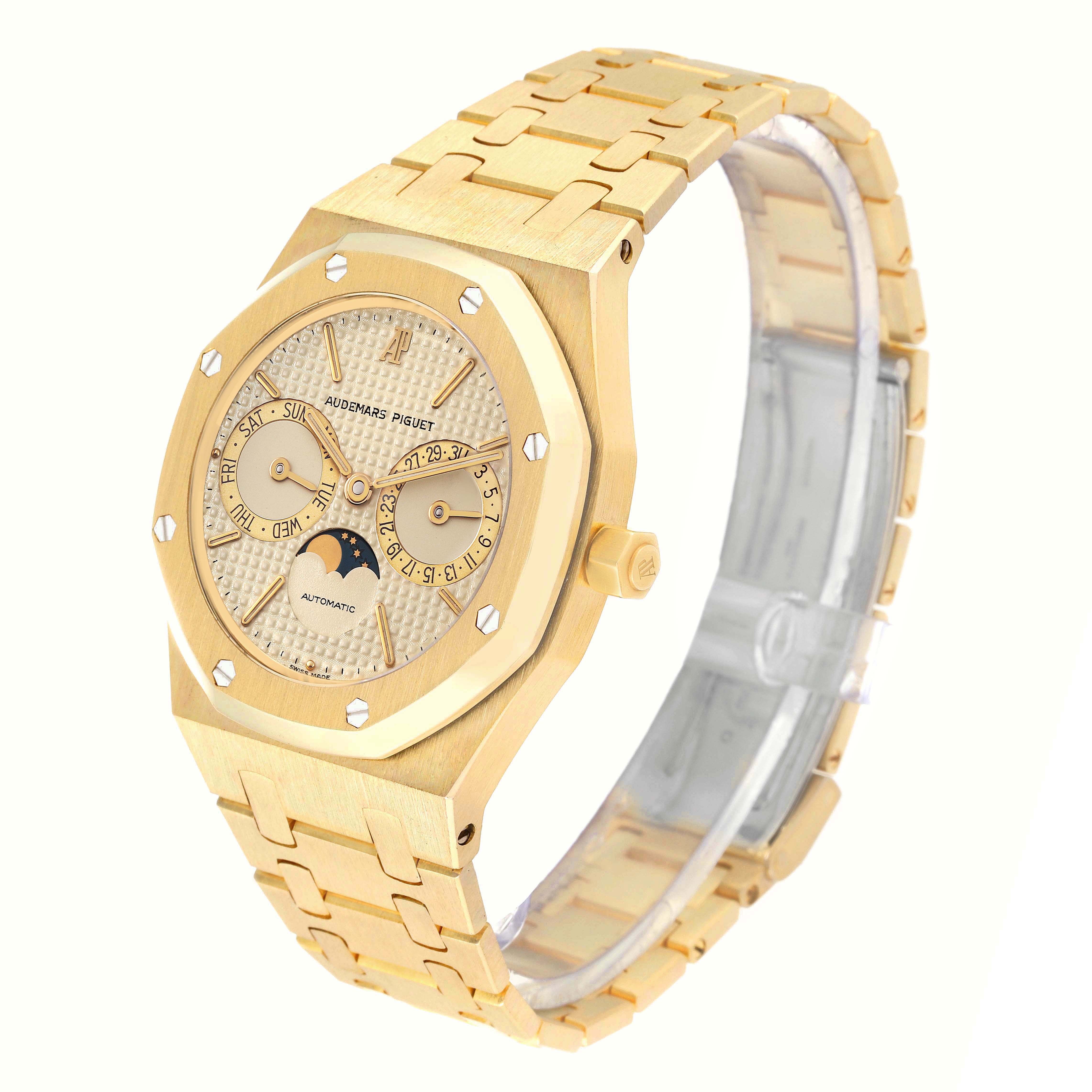 The image shows a side-angle view of an Audemars Piguet Royal Oak 25594BA.OO.0477BA.01 Men's Yellow Gold Champagne Dial 25594BA.OO.0477BA.01 Men's Yellow Gold Champagne Dial watch, highlighting its bracelet, case, and dial.