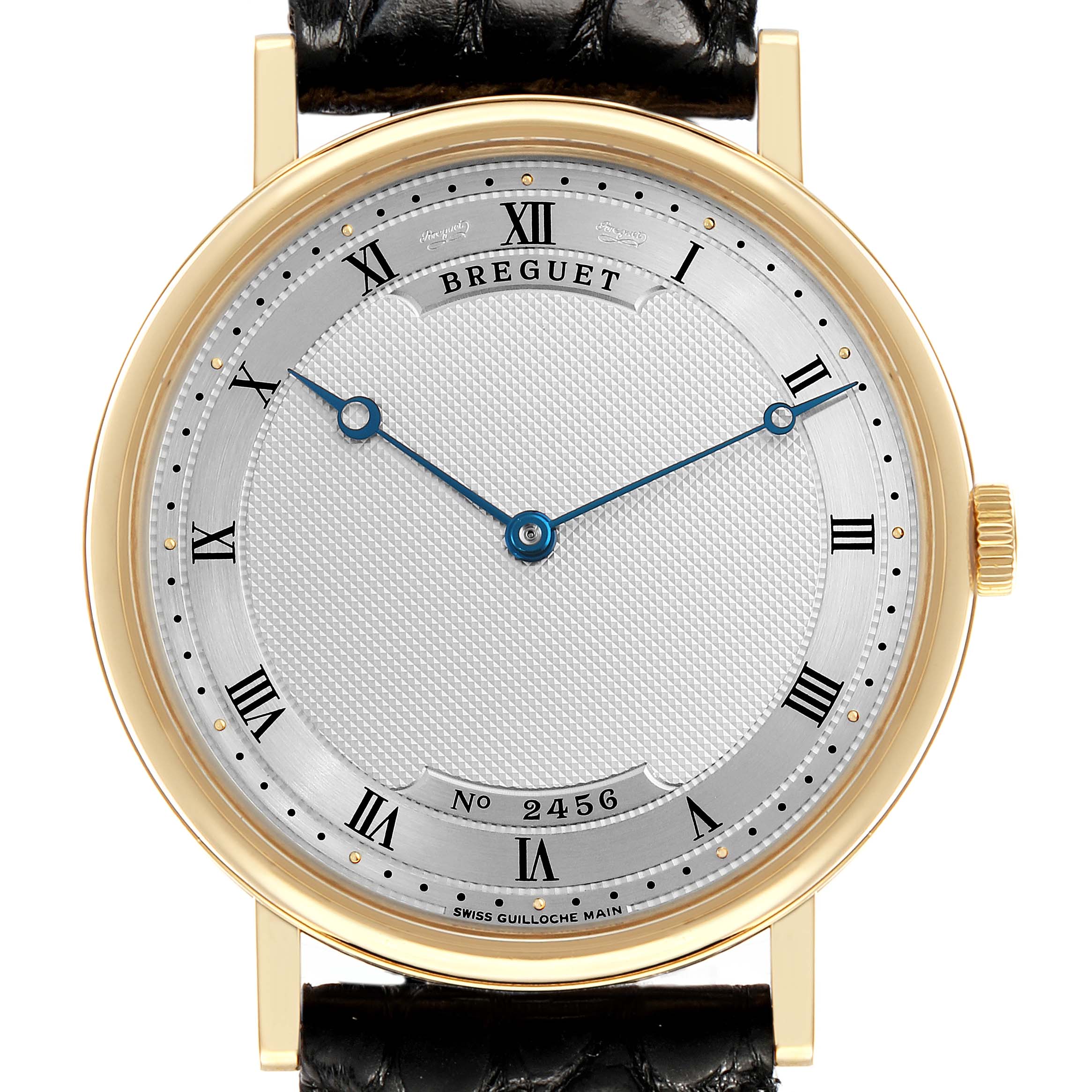 The Breguet Classique 5157BA Men's Yellow Gold Silver Dial watch is shown from the front, highlighting its dial, blue hands, Roman numerals, and leather strap.