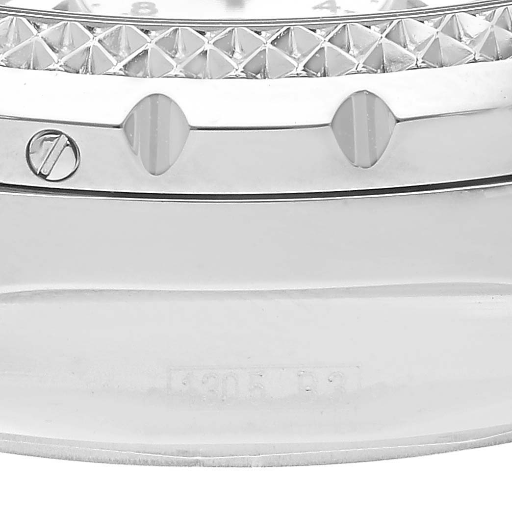 This image shows a partial side view of the bezel and case of a Bentley model watch by Breitling.