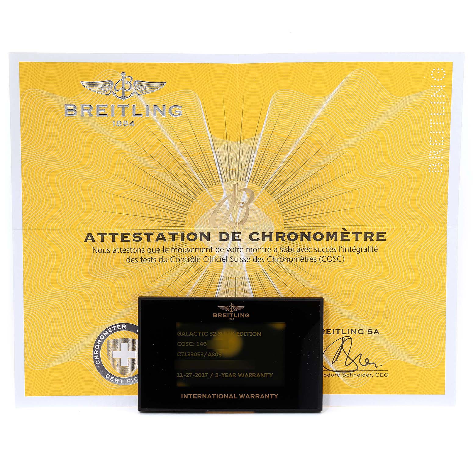 The image shows the warranty card and certificate for the Breitling C7133053/A803-792C Women's Steel and Gold (two tone) Mother of Pearl Dial C7133053/A803-792C Women's Steel and Gold (two tone) Mother of Pearl Dial Galactic 32 Steel Rose Gold MOP Diamond Ladies Watch C71330.