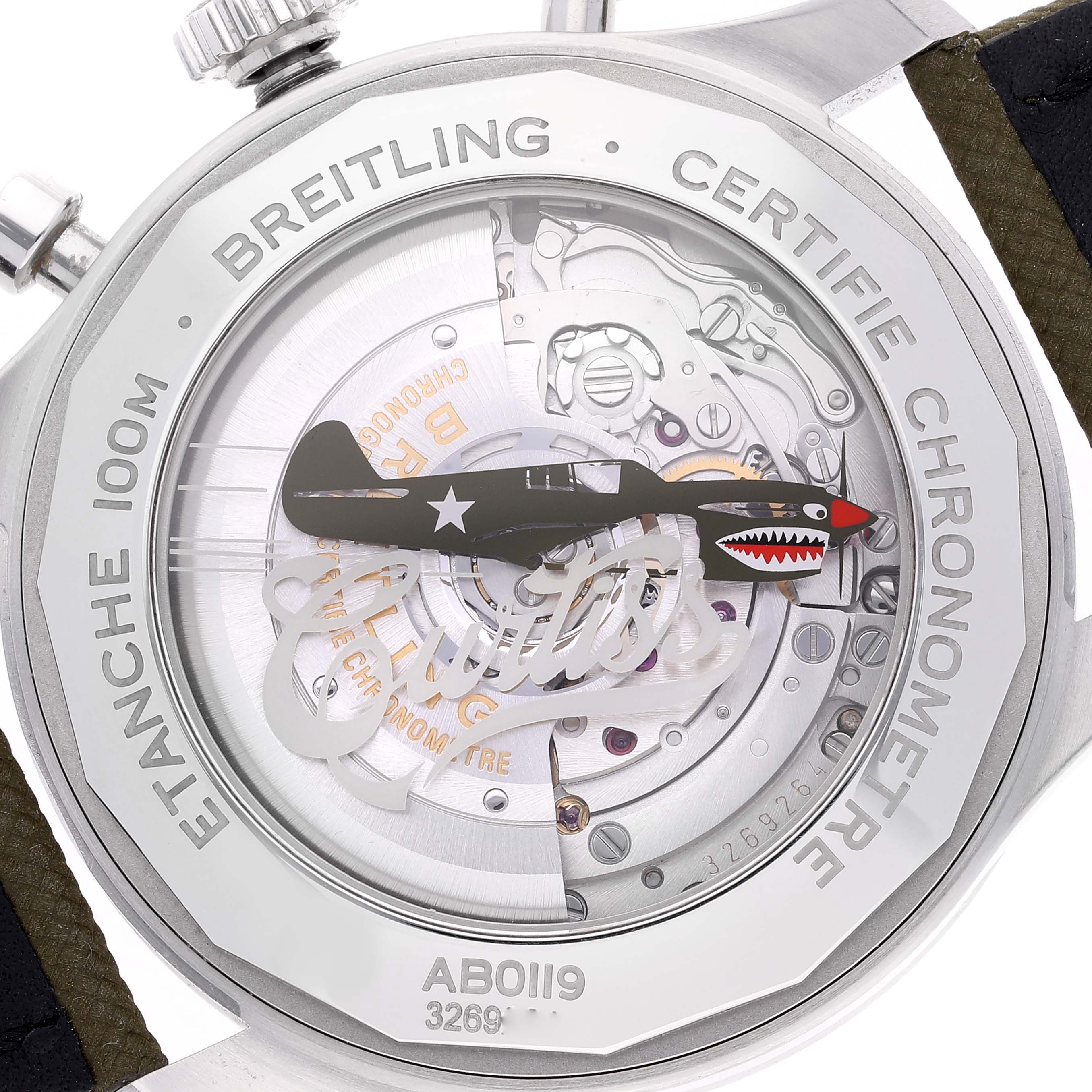 The image shows the transparent case back and internal mechanism of a Breitling Navitimer watch.