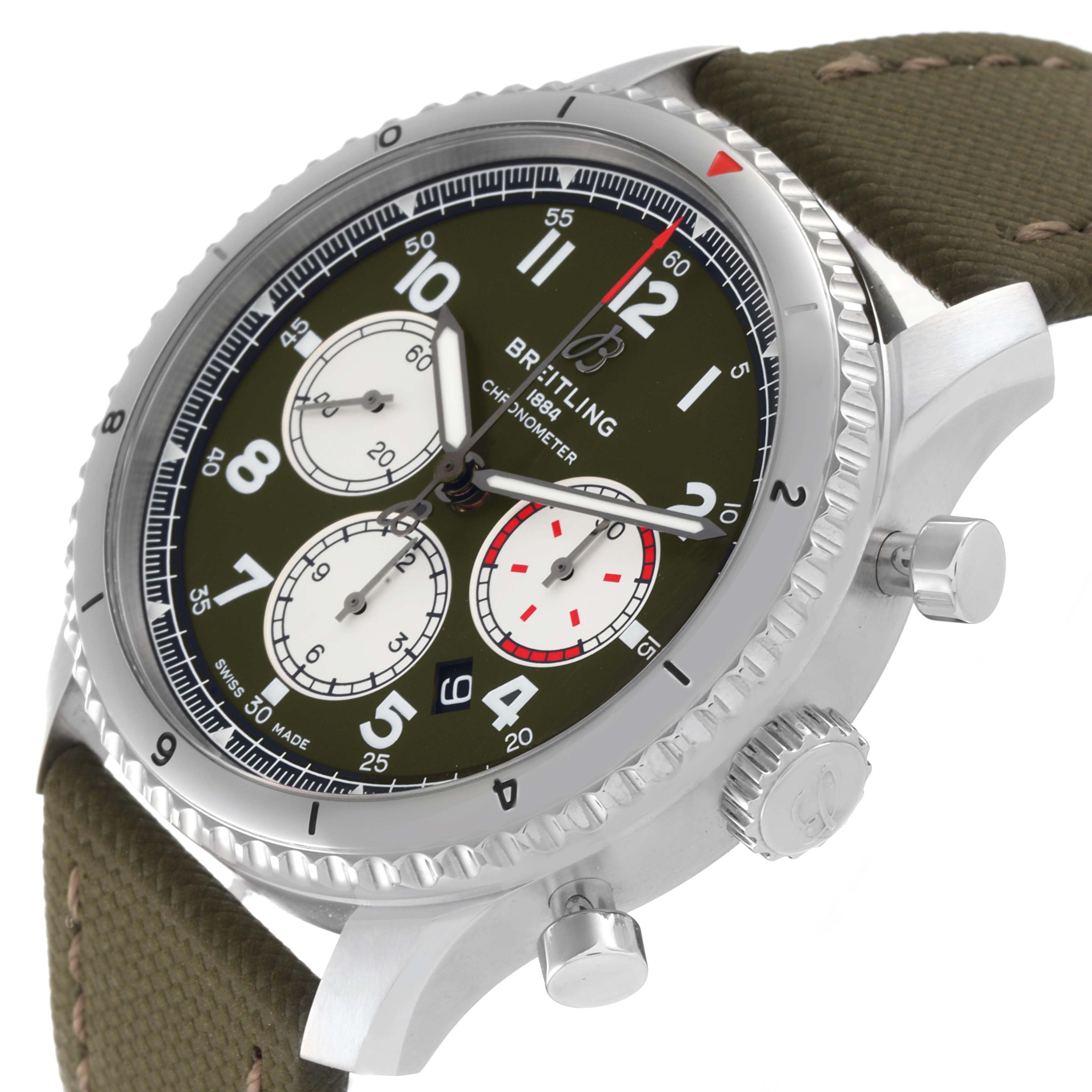 The Breitling Navitimer watch is shown at a slight angle, displaying the face, bezel, crown, and pushers, with a green strap.