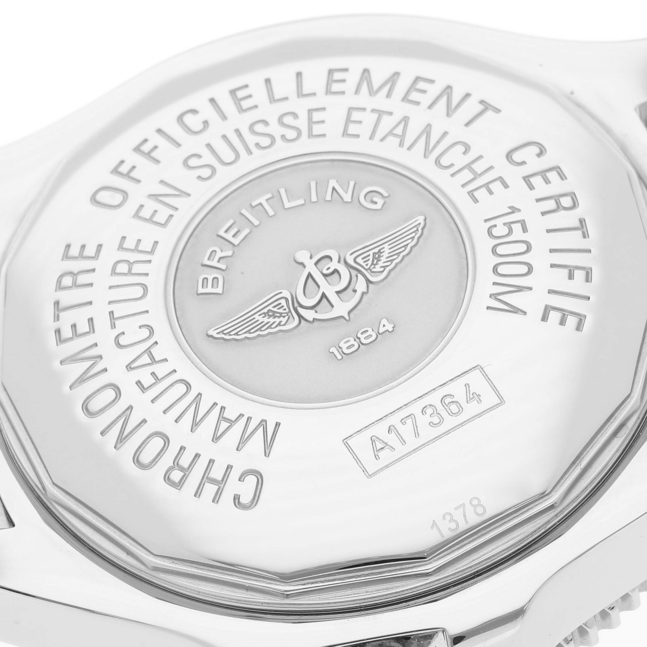 This image shows the back case of the Breitling Superocean A17364 Men's Stainless Steel Black Dial A17364 Men's Stainless Steel Black Dial watch at an angle emphasizing the engraved details.