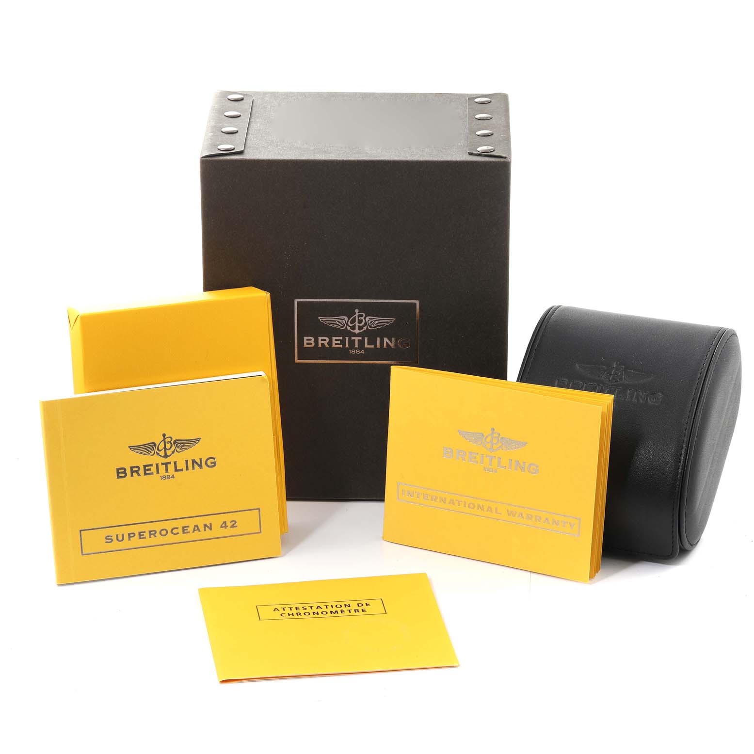 The image shows Breitling Superocean A17364 Men's Stainless Steel Black Dial A17364 Men's Stainless Steel Black Dial watch packaging, warranty, instruction booklets, and a black leather watch case.