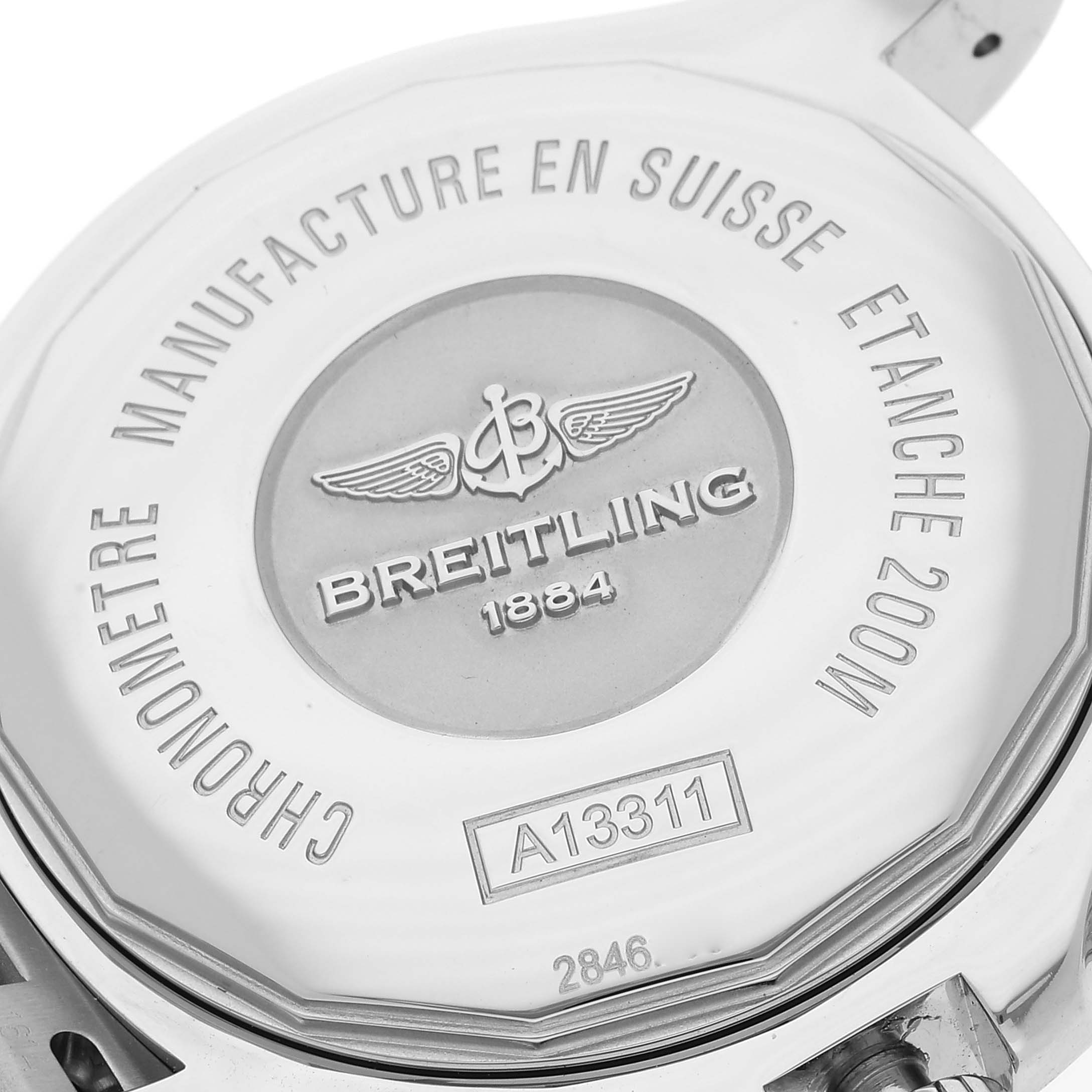 The image shows the back case of a Breitling Superocean A13311 Men's Stainless Steel Blue Dial A13311 Men's Stainless Steel Blue Dial watch, highlighting its engravings and model number A13311.