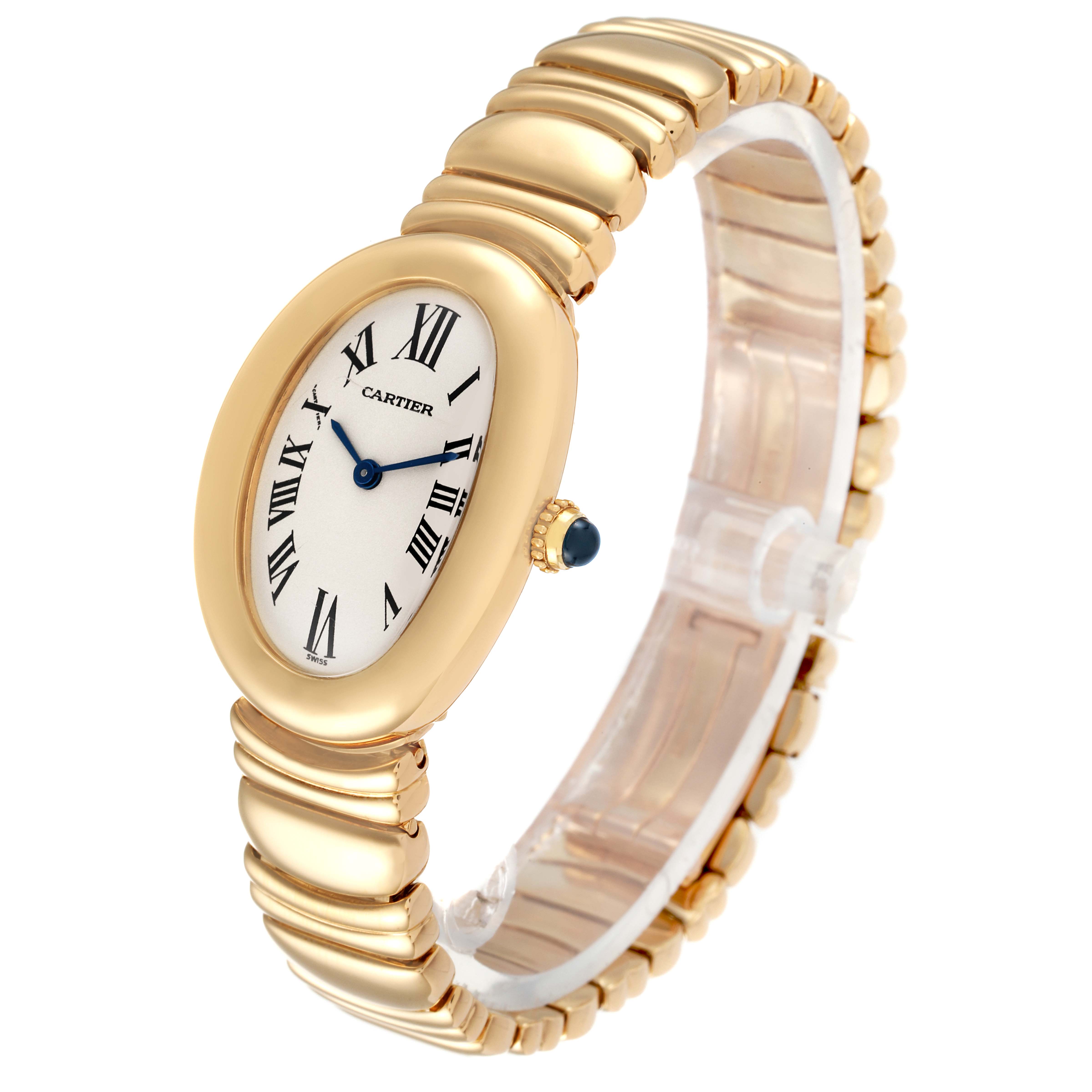 The Cartier Baignoire 1954 Women's Yellow Gold Silver Dial 1954 Women's Yellow Gold Silver Dial watch is shown at a three-quarter angle, highlighting its gold bracelet and oval face with Roman numerals.