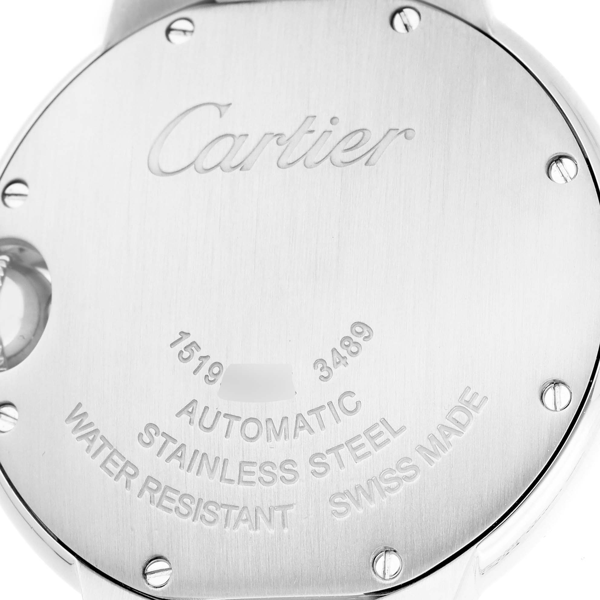 The image shows the back of a Cartier Ballon Bleu W6920071 Women's Stainless Steel Silver Dial watch, highlighting its engraved details and screws.