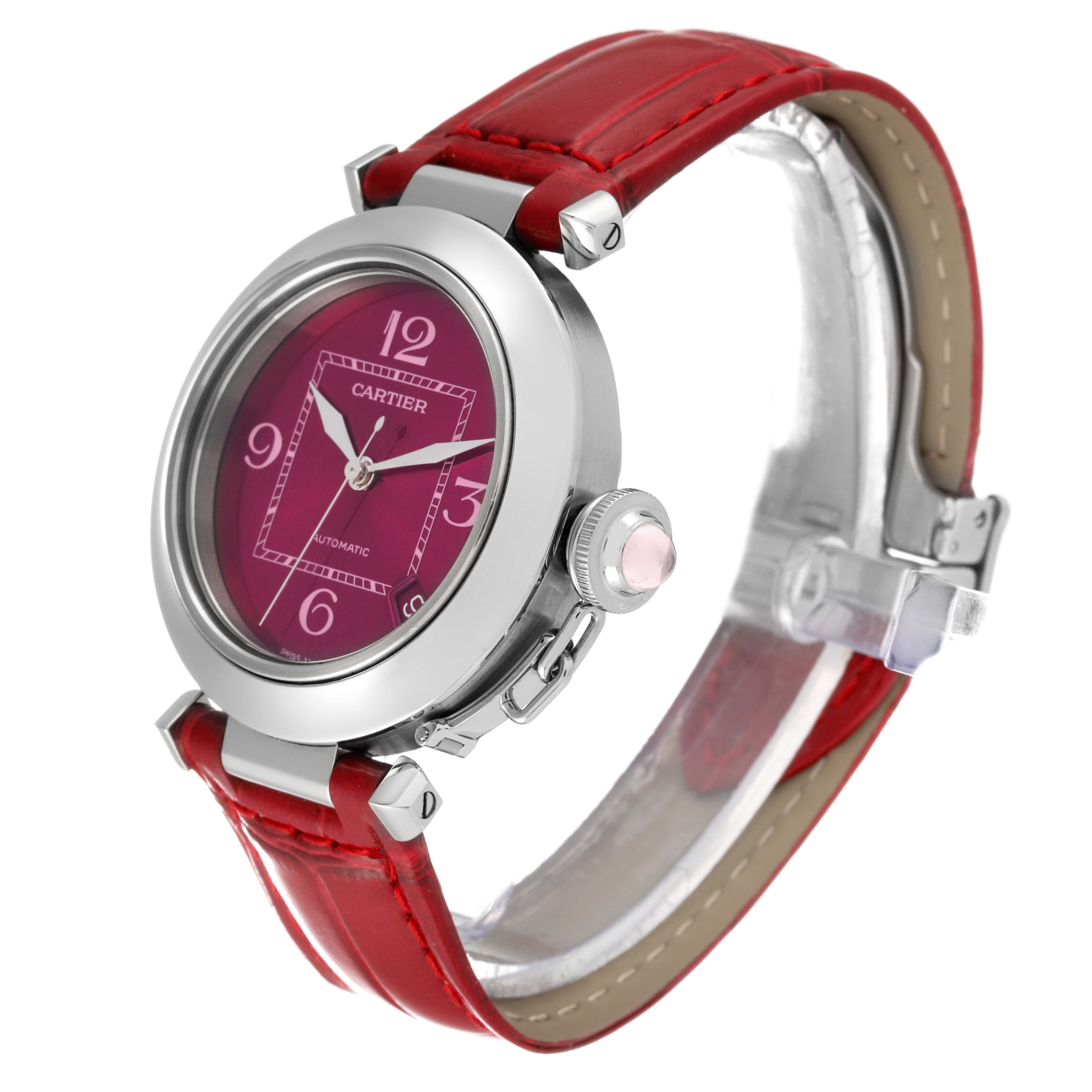 The image shows a side angle of the Cartier Pasha W3108299 Women's Stainless Steel Pink Dial W3108299 Women's Stainless Steel Pink Dial watch, highlighting its red strap, case, and crown.