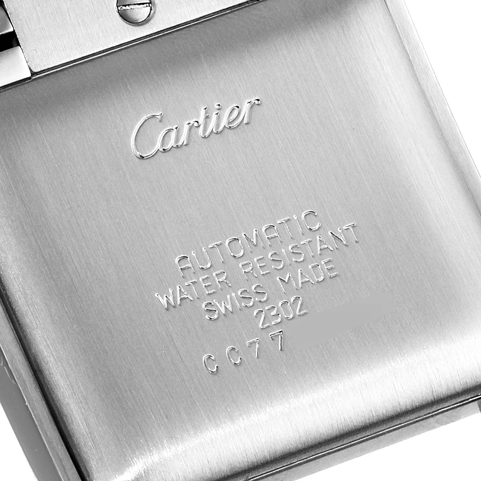 This image shows the back case of a Cartier Tank Française watch, highlighting the brand and model engraving details.